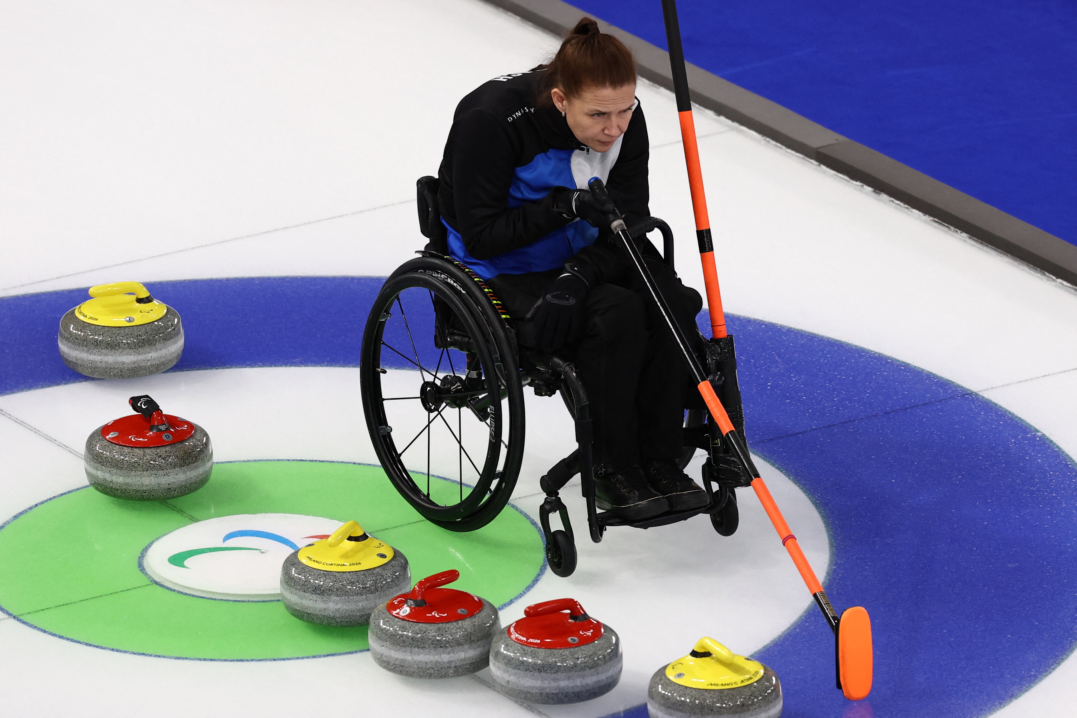 Milano Cortina 2026 Paralympics - Wheelchair Curling - Mixed Doubles Round Robin Session 4 - Estonia vs Latvia - Cortina Curling Olympic Stadium, Cortina d'Ampezzo, Italy - March 06, 2026. Katlin Riidebach of Estonia in action REUTERS/Louisa Gouliamaki