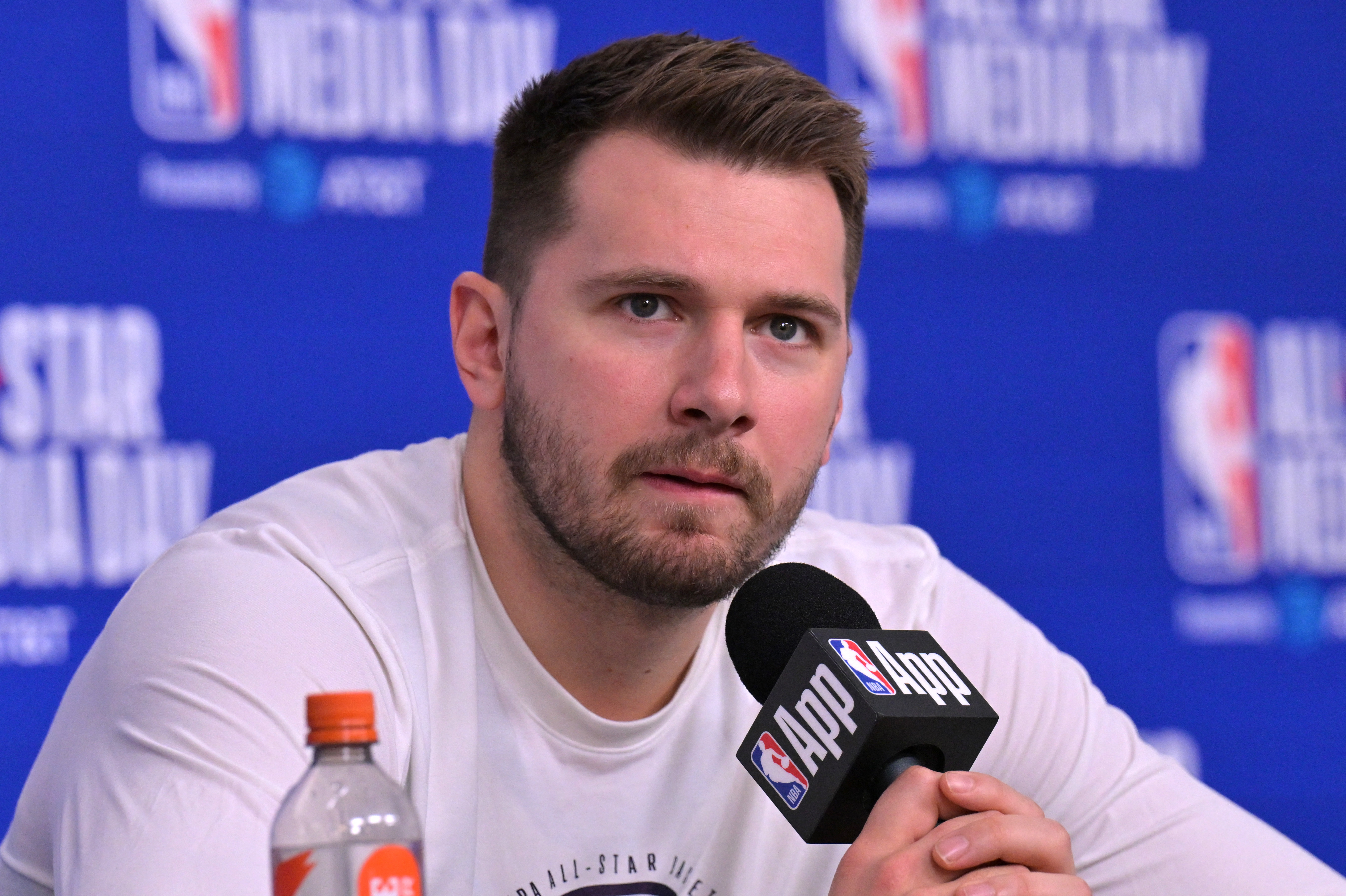 Feb 14, 2026; Los Angeles, CA, USA; 	Team World guard Luka Doncic (77) of the Los Angeles Lakers during a news conference for the NBA All Star game at Intuit Dome. Mandatory Credit: Jayne Kamin-Oncea-Imagn Images