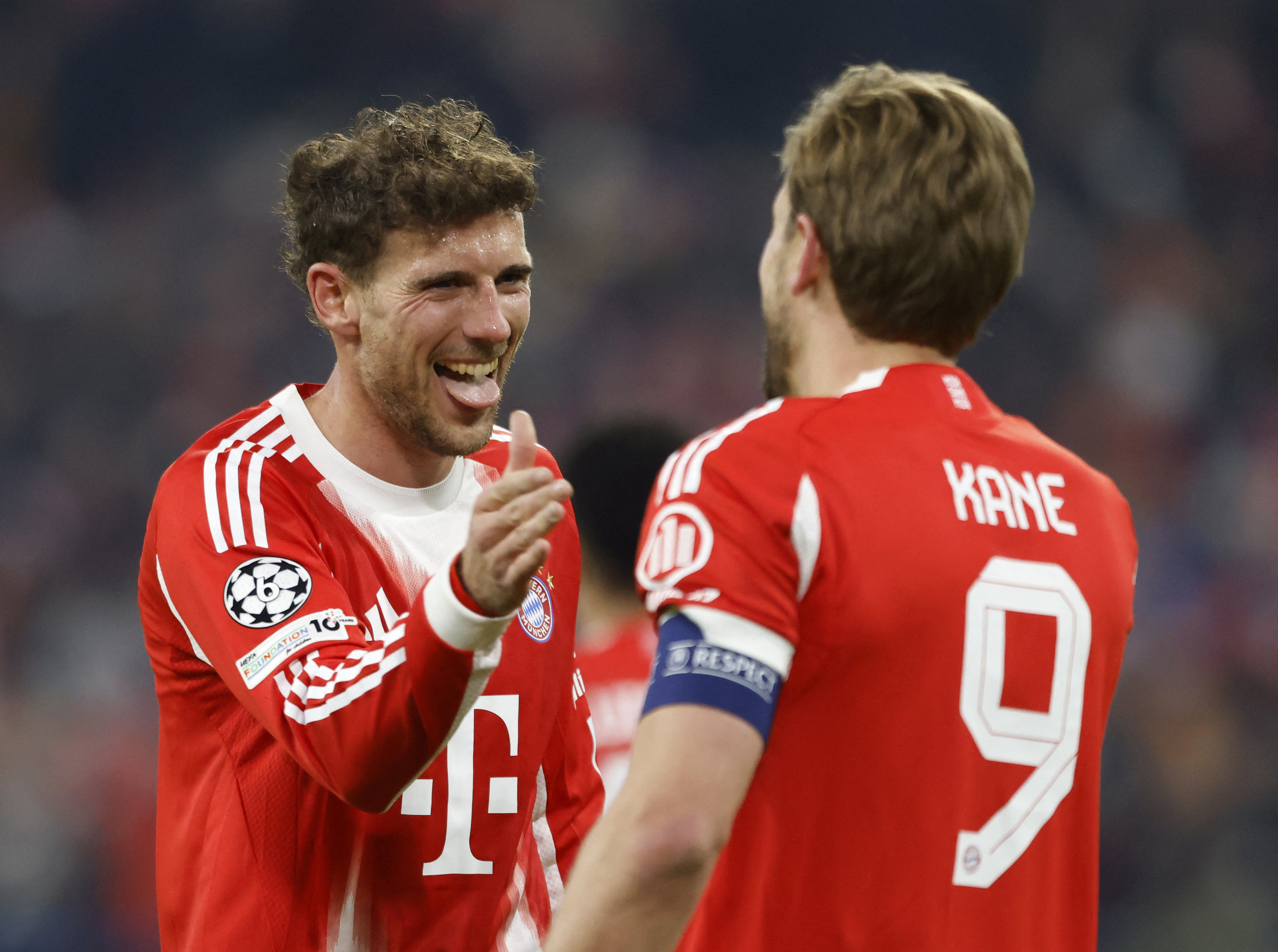 Soccer Football - UEFA Champions League - Round of 16 - Second Leg - Bayern Munich v Atalanta - Allianz Arena, Munich, Germany - March 18, 2026 Bayern Munich's Harry Kane celebrates scoring their second goal with Leon Goretzka REUTERS/Michaela Stache