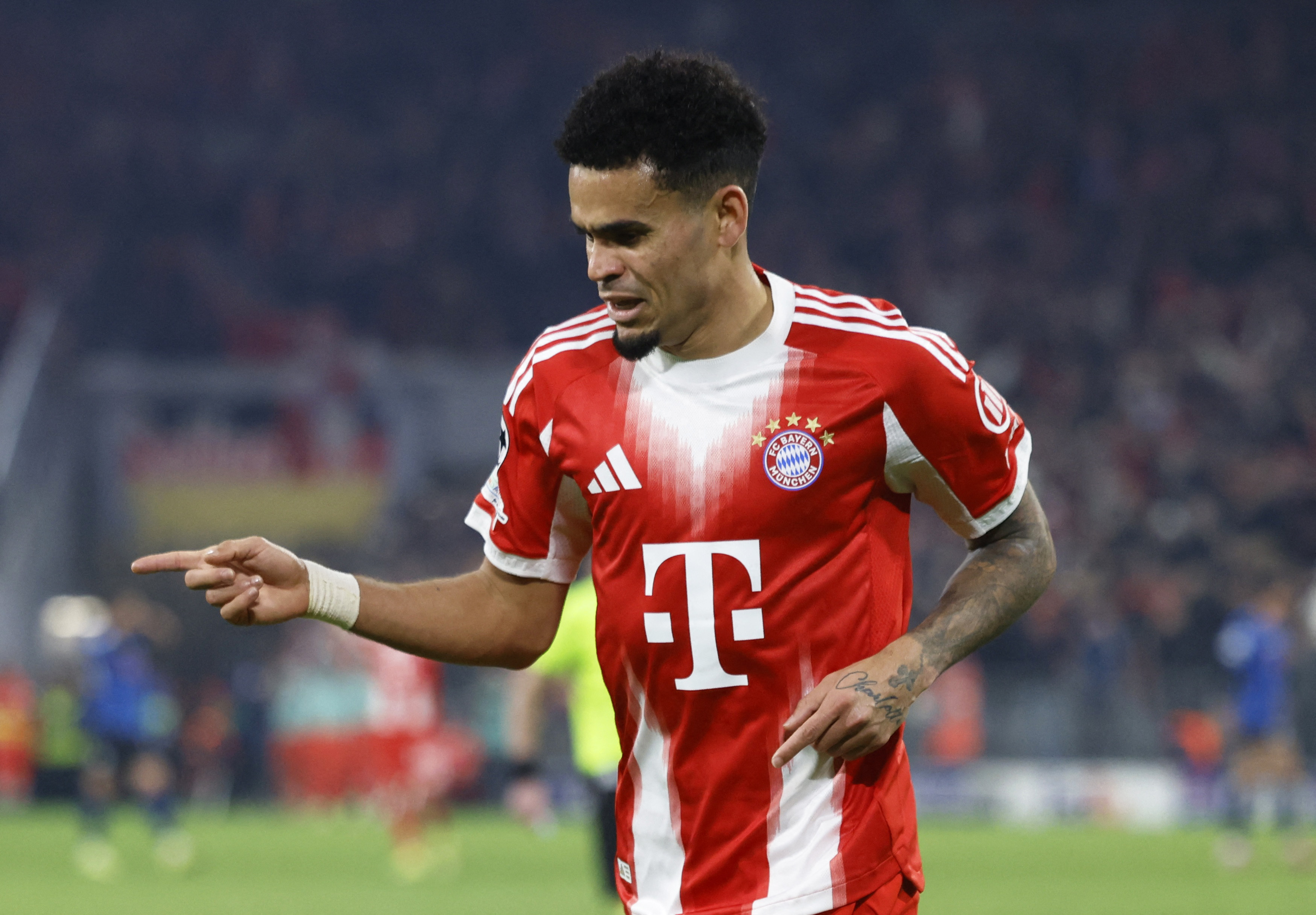 Soccer Football - UEFA Champions League - Round of 16 - Second Leg - Bayern Munich v Atalanta - Allianz Arena, Munich, Germany - March 18, 2026 Bayern Munich's Luis Diaz celebrates scoring their fourth goal REUTERS/Michaela Stache