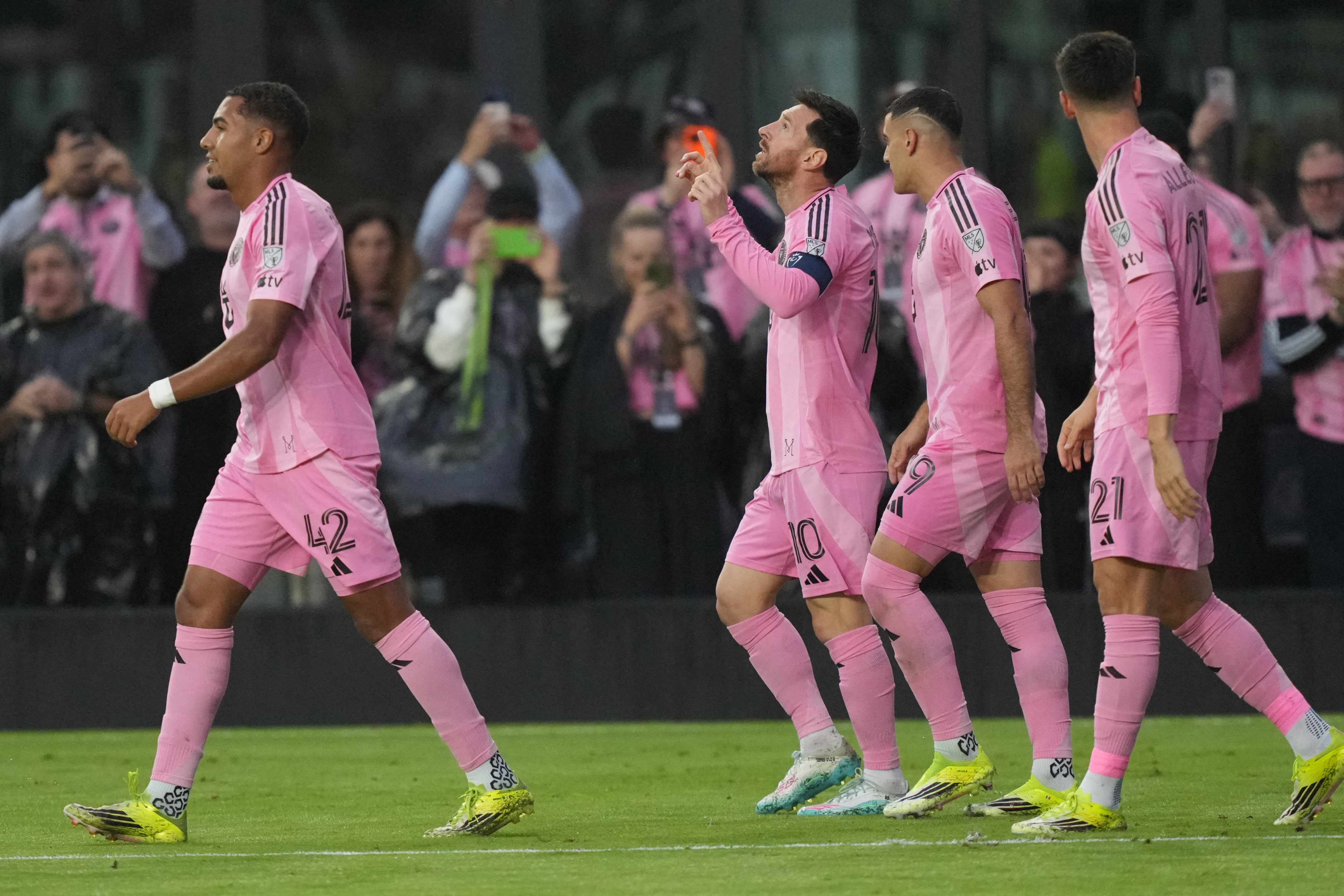 Mar 18, 2026; Fort Lauderdale, Florida, USA;  Inter Miami forward Lionel Messi, center, celebrates scoring a goal against Nashville SC during the first half at Chase Stadium. The goal was the 900th of Messi’s career. Mandatory Credit: Jim Rassol-Imagn Ima