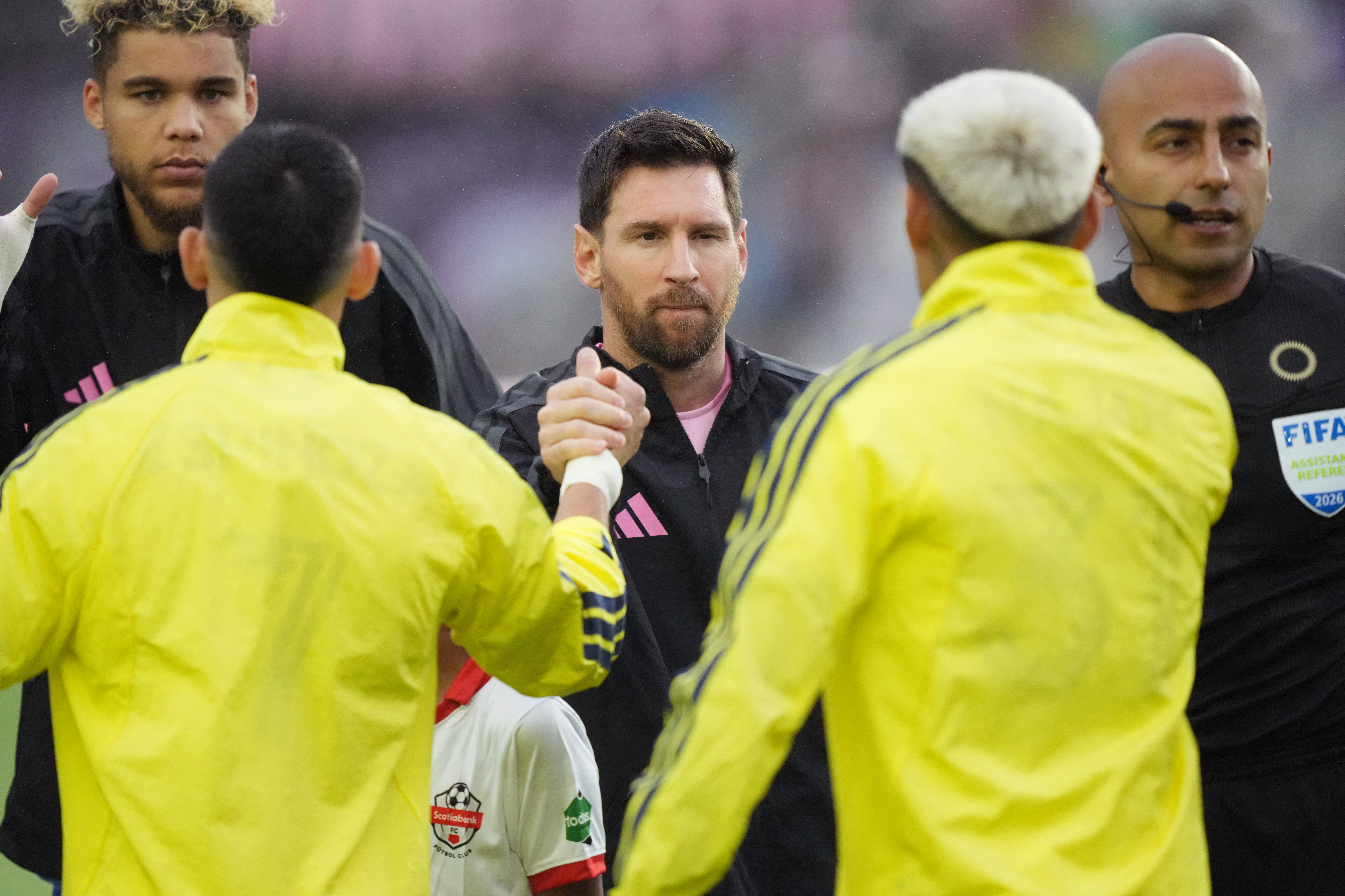 Mar 18, 2026; Fort Lauderdale, Florida, USA;  Inter Miami forward Lionel Messi (10) greets Nashville SC players during pregame ceremonies at Chase Stadium. Mandatory Credit: Jim Rassol-Imagn Images