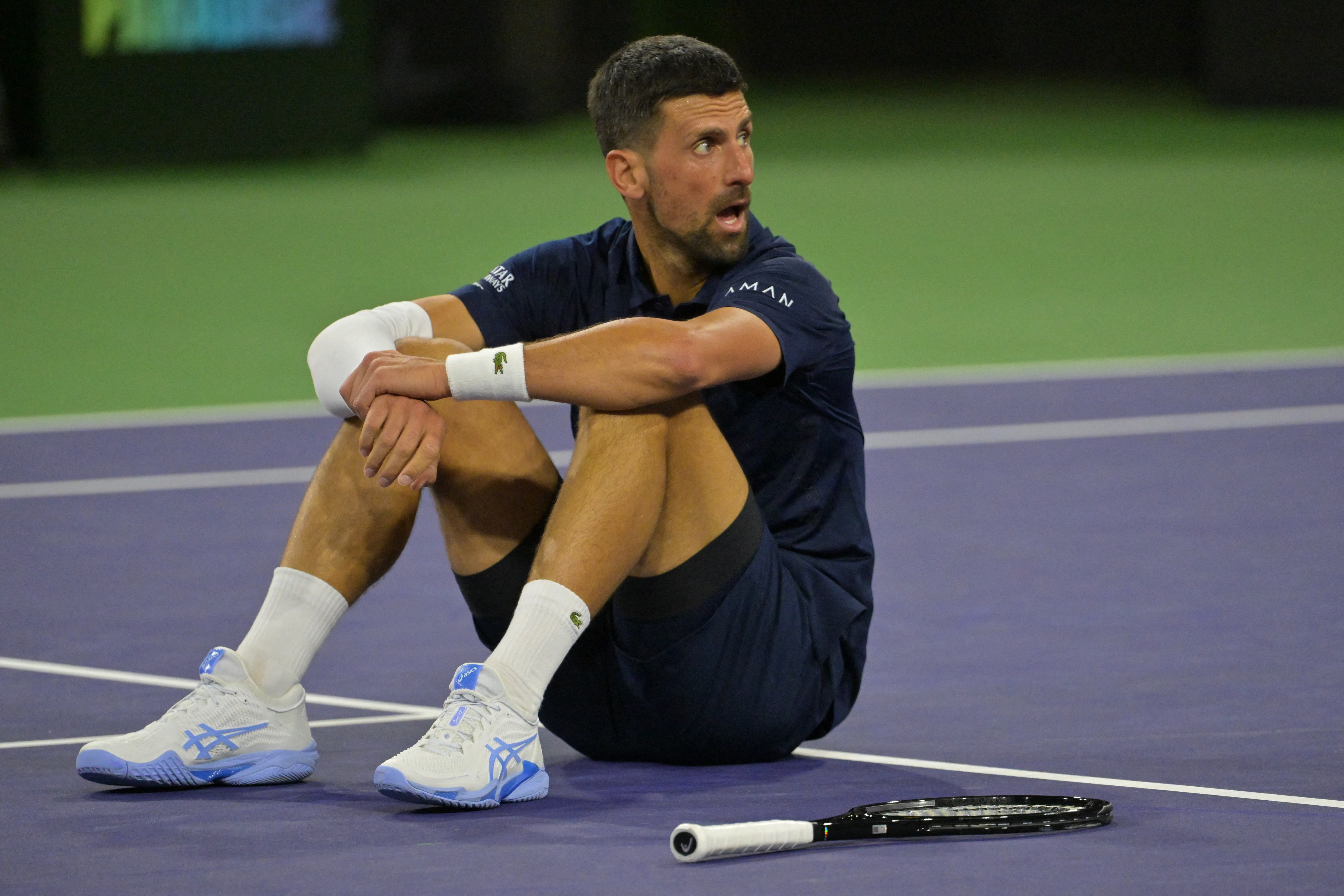 Mar 11, 2026; Indian Wells, CA, USA;  Novak Djokovic (SRB) takes a moment on the court after a long rally during his fourth round match against Jack Draper (GBR) in the BNP Paribas Open at the Indian Wells Tennis Garden. Mandatory Credit: Jayne Kamin-Once