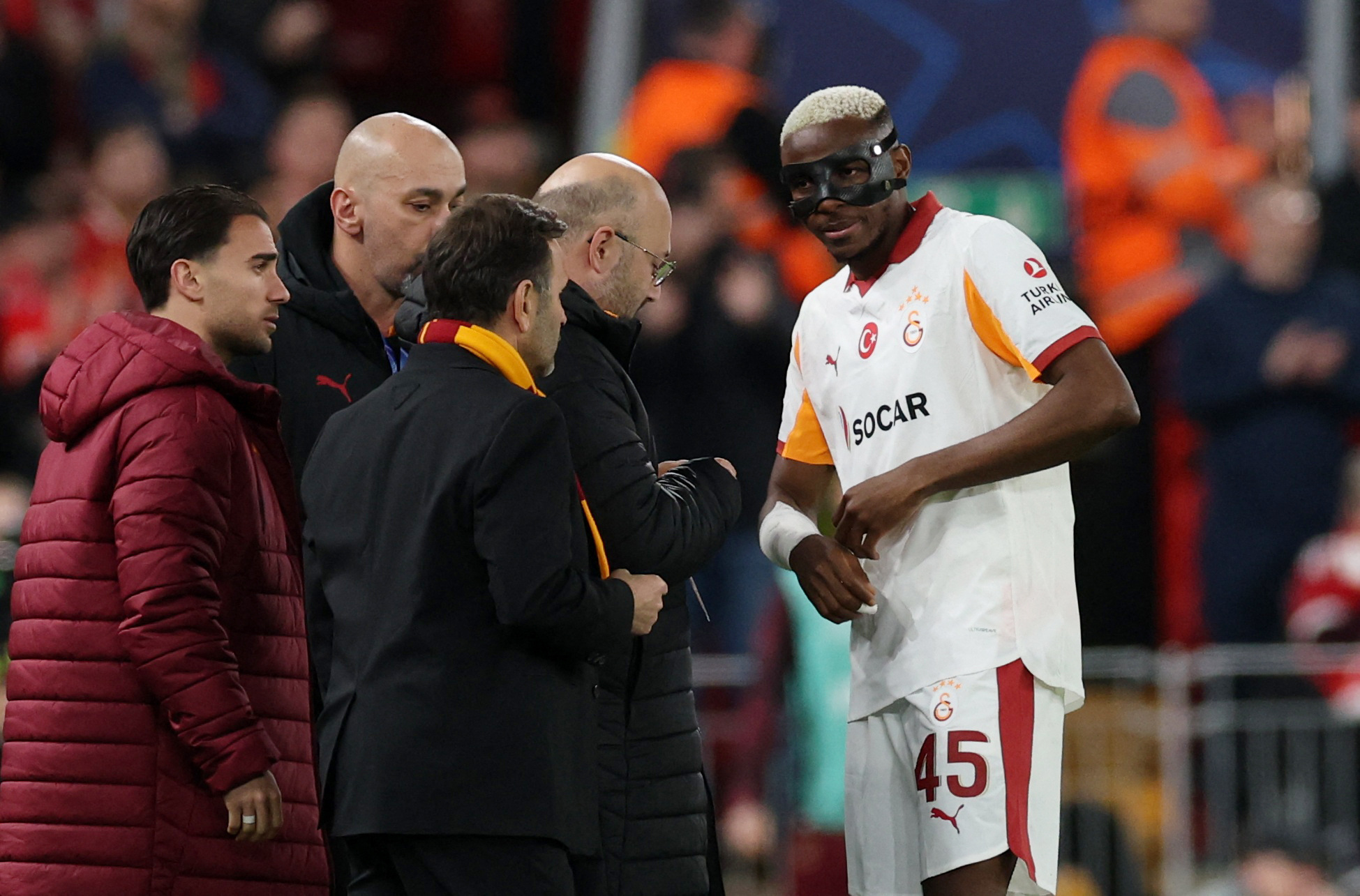 Soccer Football - UEFA Champions League - Round 16 - Second Leg - Liverpool v Galatasaray - Anfield, Liverpool, Britain - March 18, 2026 Galatasaray's Victor Osimhen receives medical attention after sustaining an injury REUTERS/Phil Noble