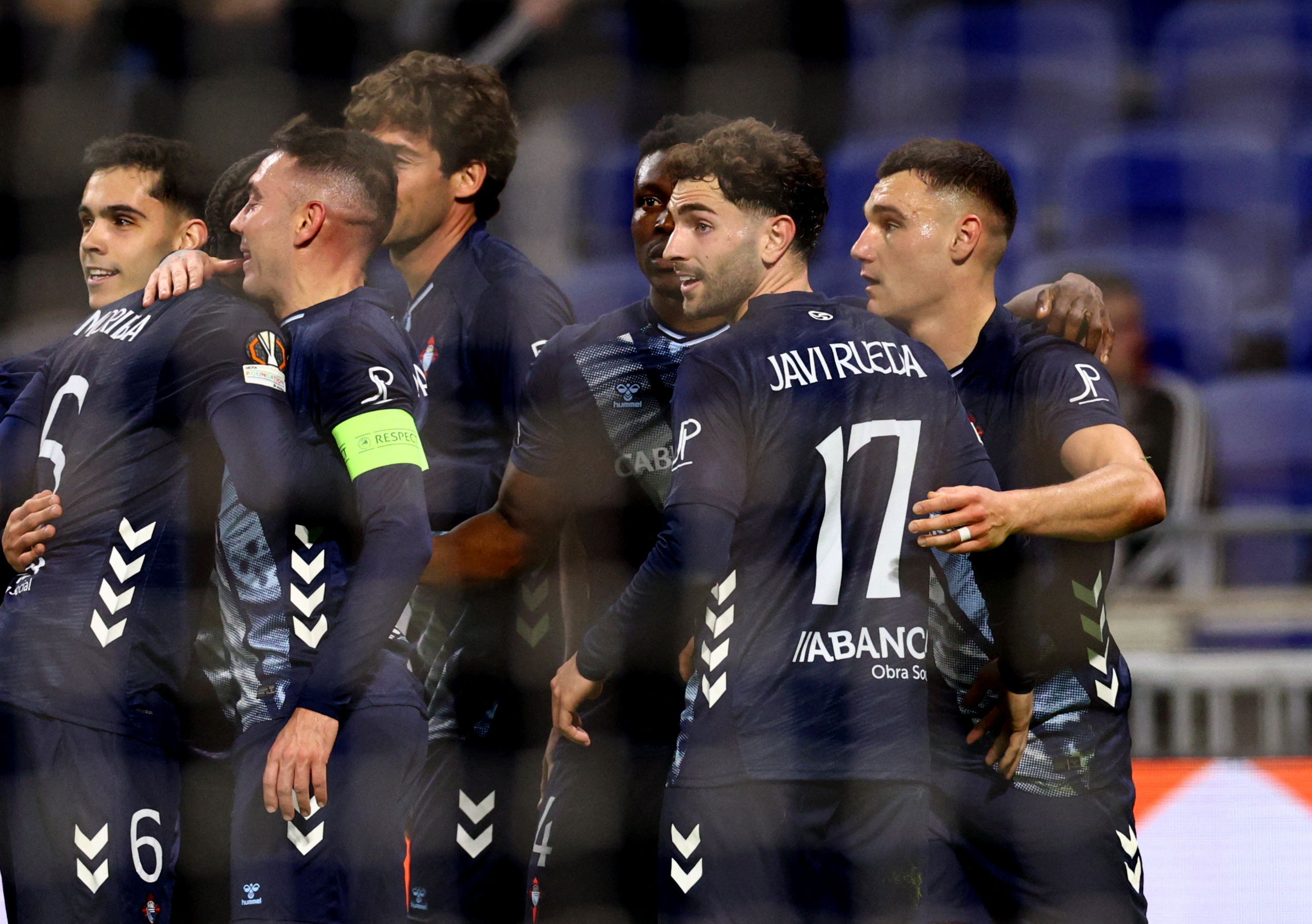 Soccer Football - UEFA Europa League - Round of 16 - Second Leg - Olympique Lyonnais v Celta Vigo - Groupama Stadium, Lyon, France - March 19, 2026 Celta Vigo's Ferran Jutgla celebrates scoring their second goal with teammates REUTERS/Manon Cruz