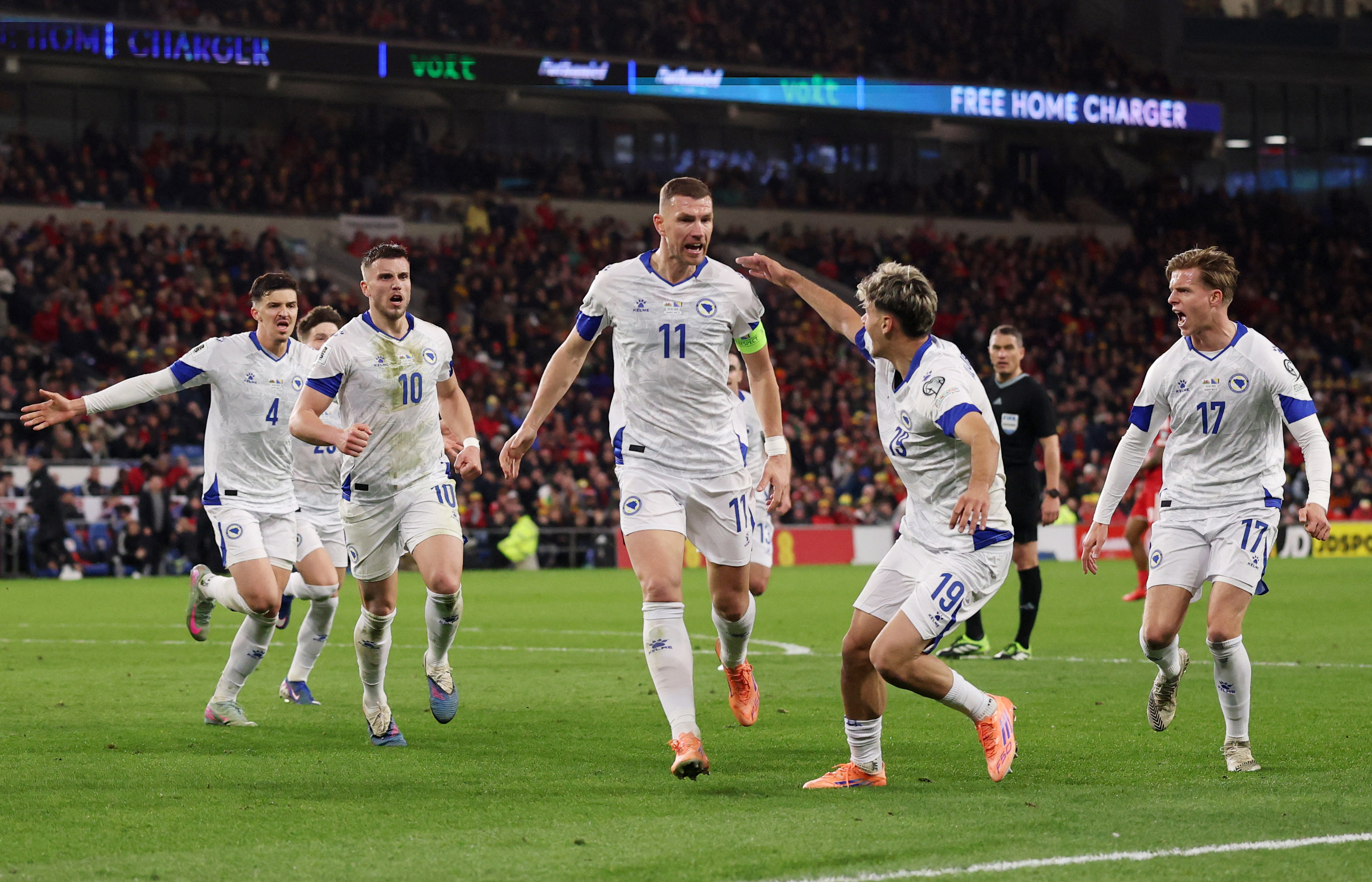 Soccer Football - FIFA World Cup - UEFA Qualifiers - Semi Final - Wales v Bosnia and Herzegovina - Cardiff City Stadium, Cardiff, Wales, Britain - March 26, 2026 Bosnia and Herzegovina's Edin Dzeko celebrates scoring their first goal with teammates REUTER