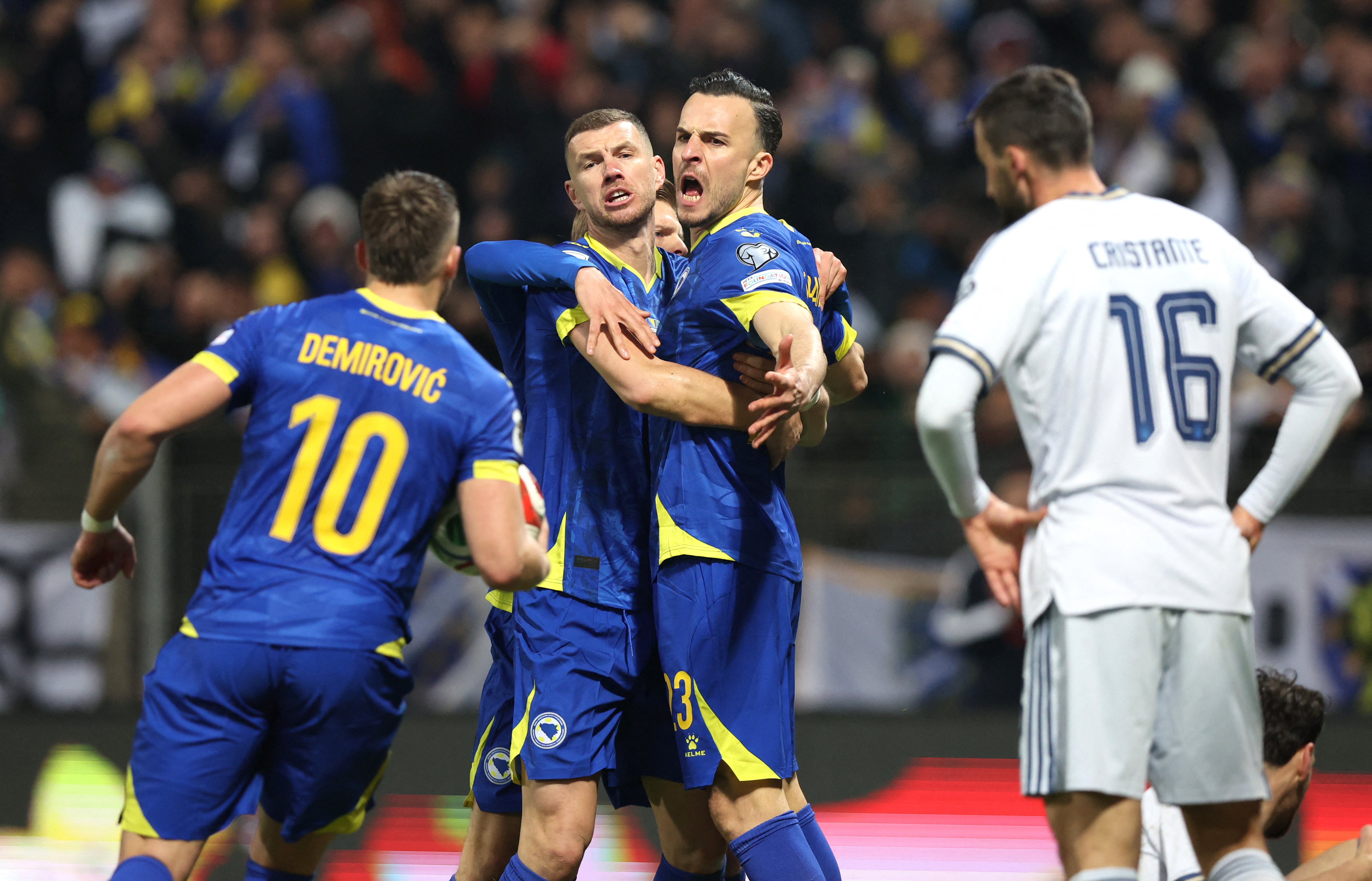 Soccer Football - FIFA World Cup - UEFA Qualifiers - Finals - Bosnia and Herzegovina v Italy - Bilino Polje Stadium, Zenica, Bosnia and Herzegovina - March 31, 2026 Bosnia and Herzegovina's Haris Tabakovic celebrates scoring their first goal with Edin Dze