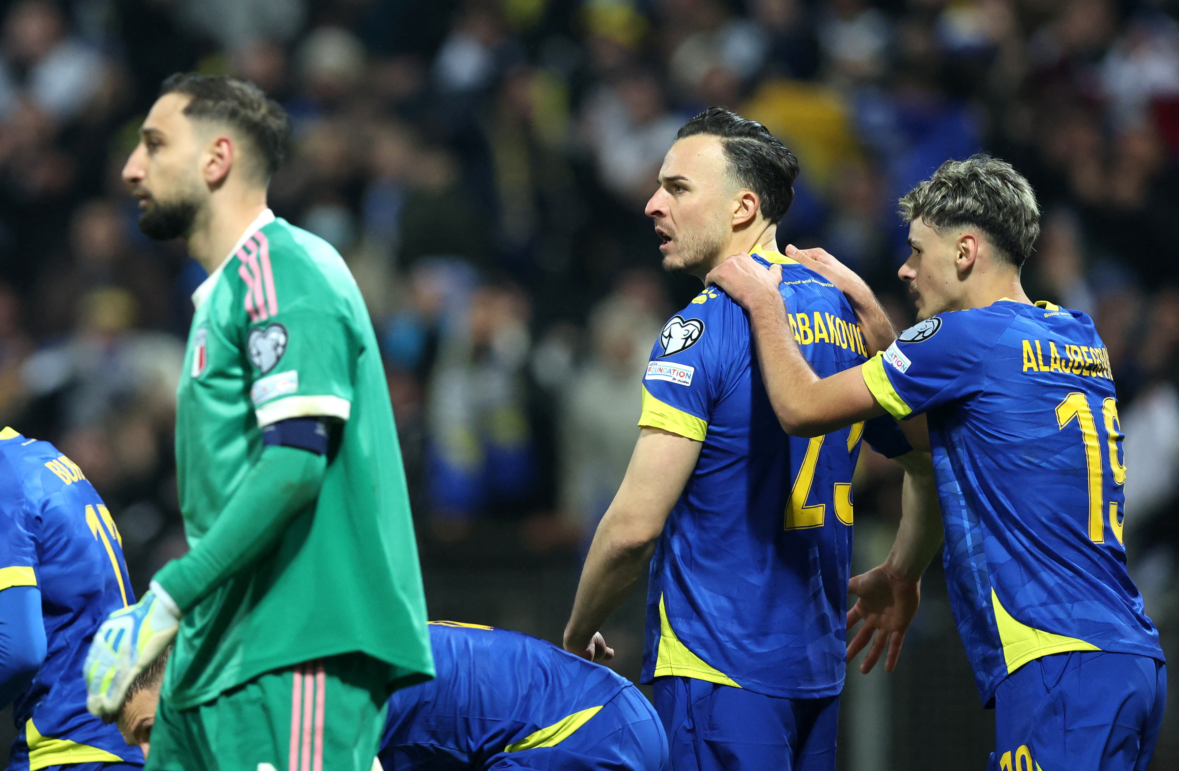 Soccer Football - FIFA World Cup - UEFA Qualifiers - Finals - Bosnia and Herzegovina v Italy - Bilino Polje Stadium, Zenica, Bosnia and Herzegovina - March 31, 2026 Bosnia and Herzegovina's Haris Tabakovic celebrates scoring their first goal with Kerim-Sa