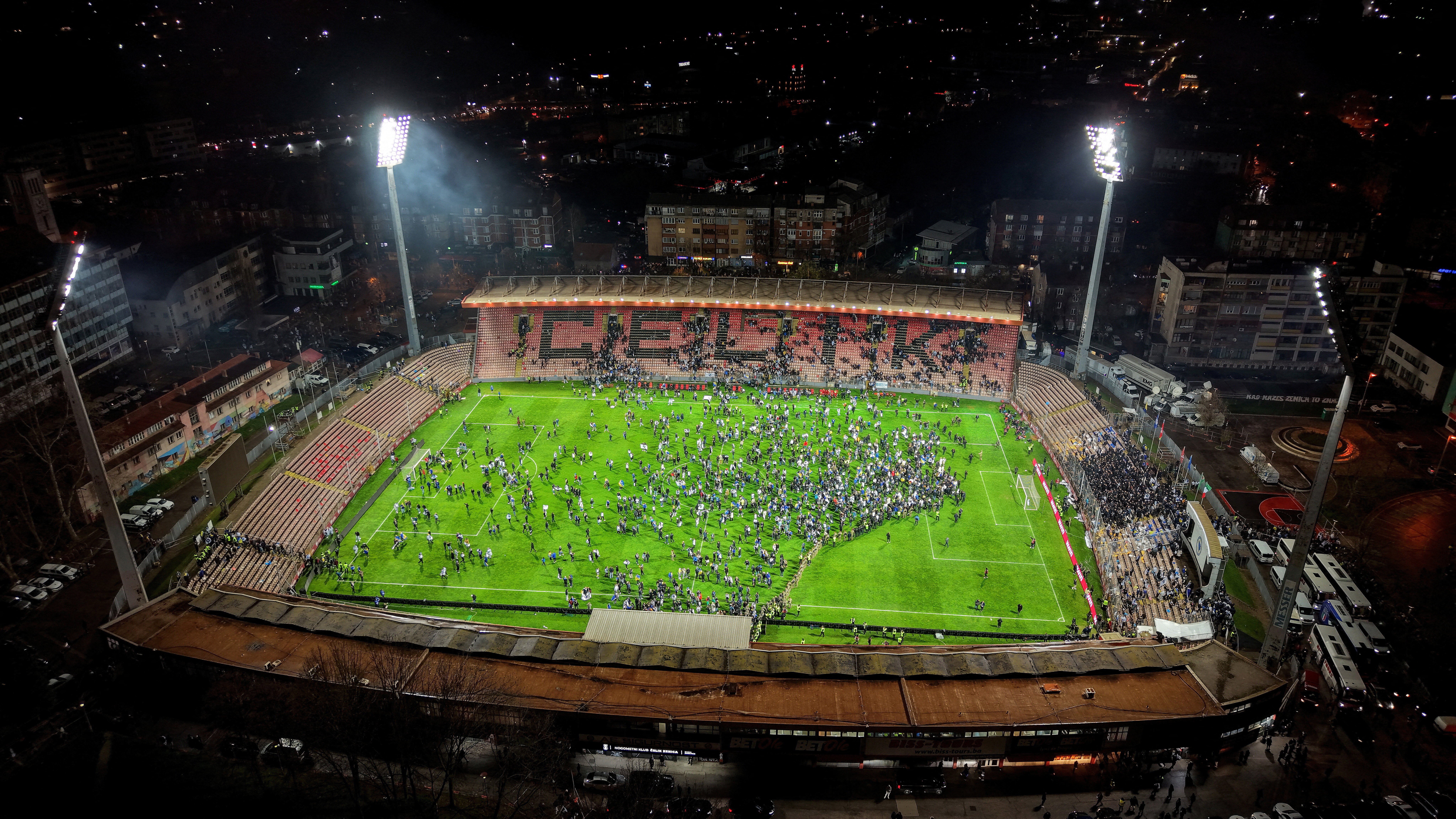 Soccer Football - FIFA World Cup - UEFA Qualifiers - Finals - Bosnia and Herzegovina v Italy - Bilino Polje Stadium, Zenica, Bosnia and Herzegovina - March 31, 2026 A drone view of fans celebrating on the pitch after Bosnia and Herzegovina qualified for t
