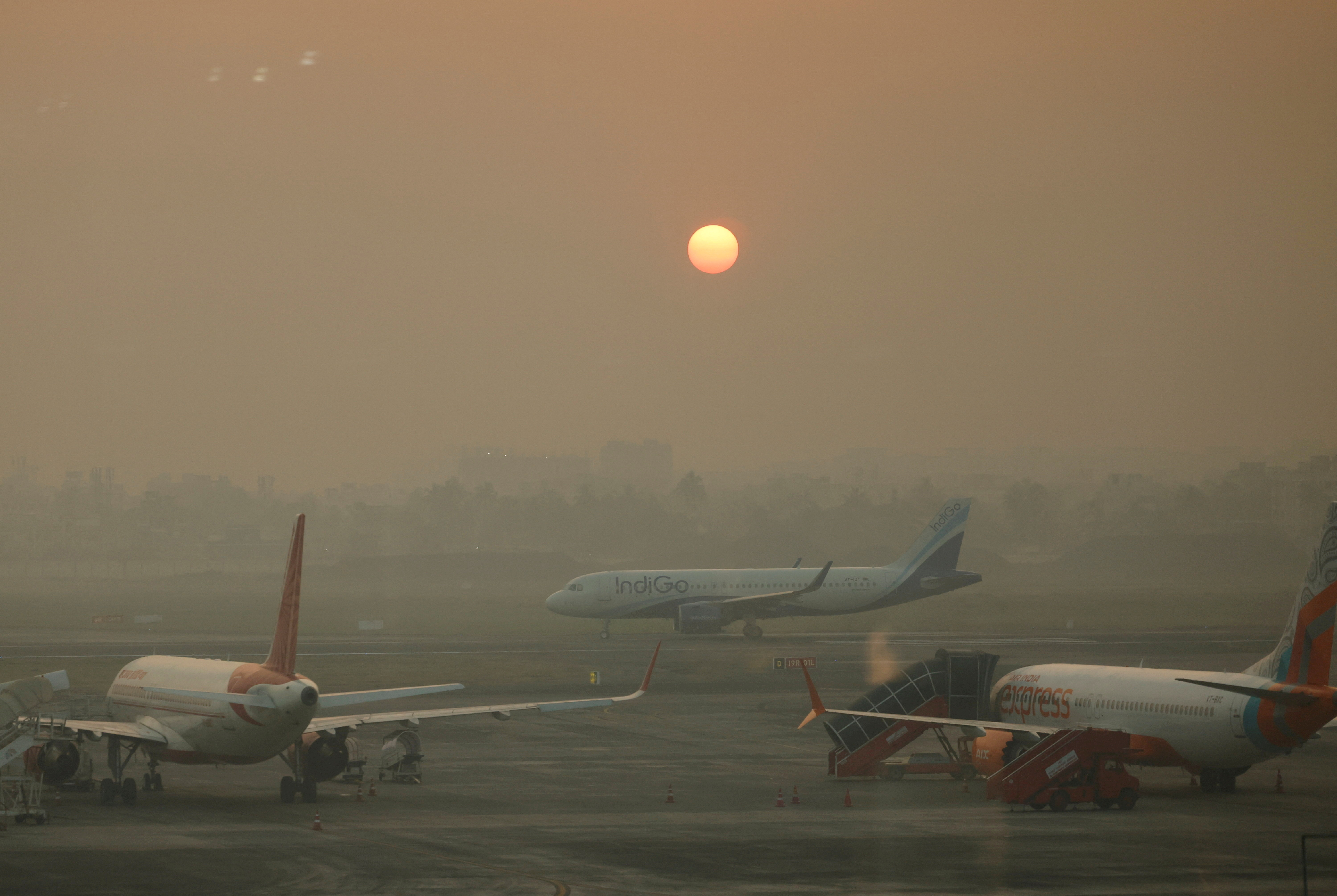 An IndiGo Airlines aircraft taxis on the tarmac on an early morning at the Netaji Subhash Chandra Bose International Airport, in Kolkata, India, November 20, 2024. REUTERS/Francis Mascarenhas/File Photo