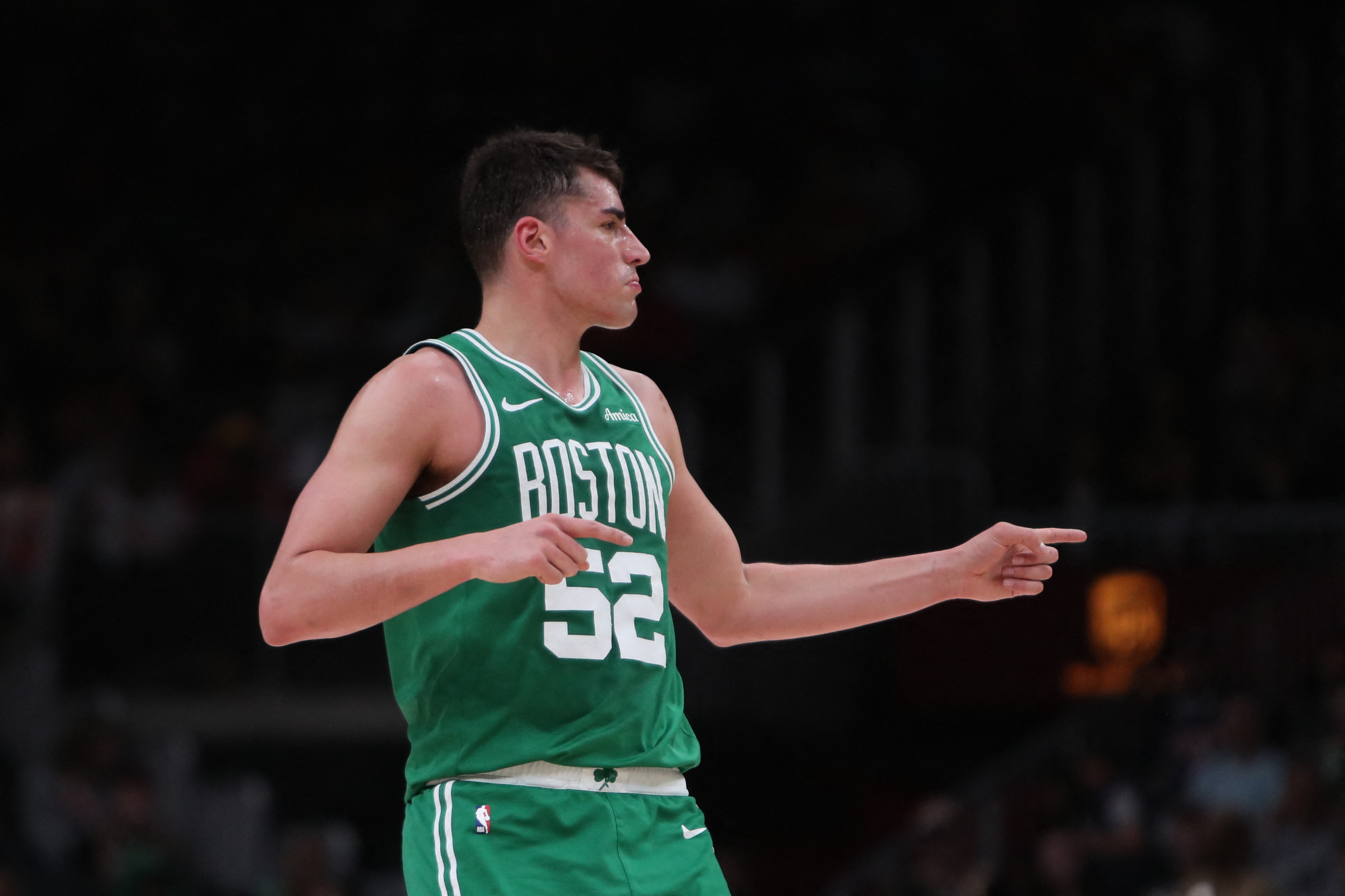 Mar 30, 2026; Atlanta, Georgia, USA; Boston Celtics center Luka Garza (52) reacts against the Atlanta Hawks in the first half at State Farm Arena. Mandatory Credit: Mady Mertens-Imagn Images