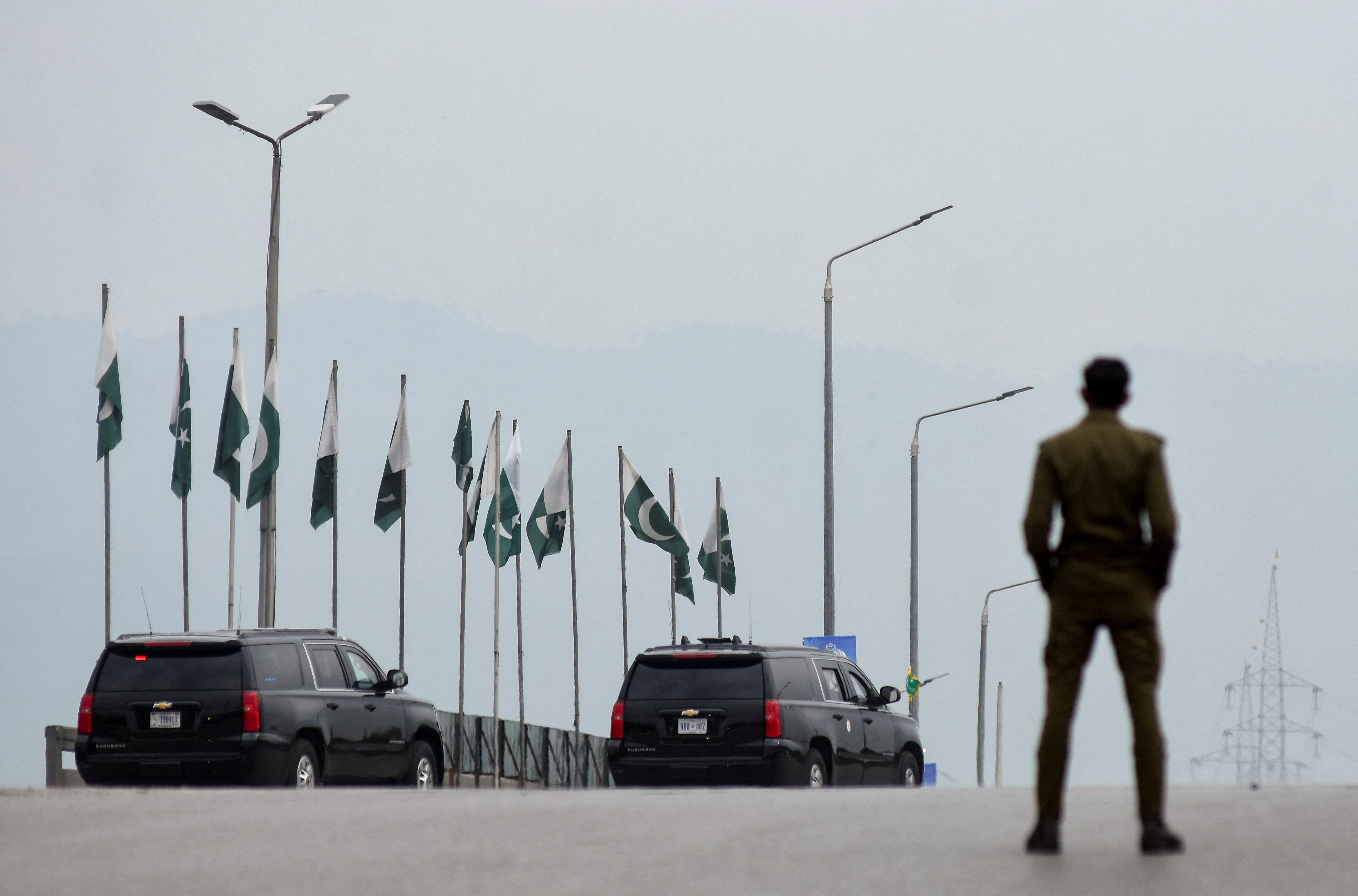 A convoy heads toward the Serena Hotel