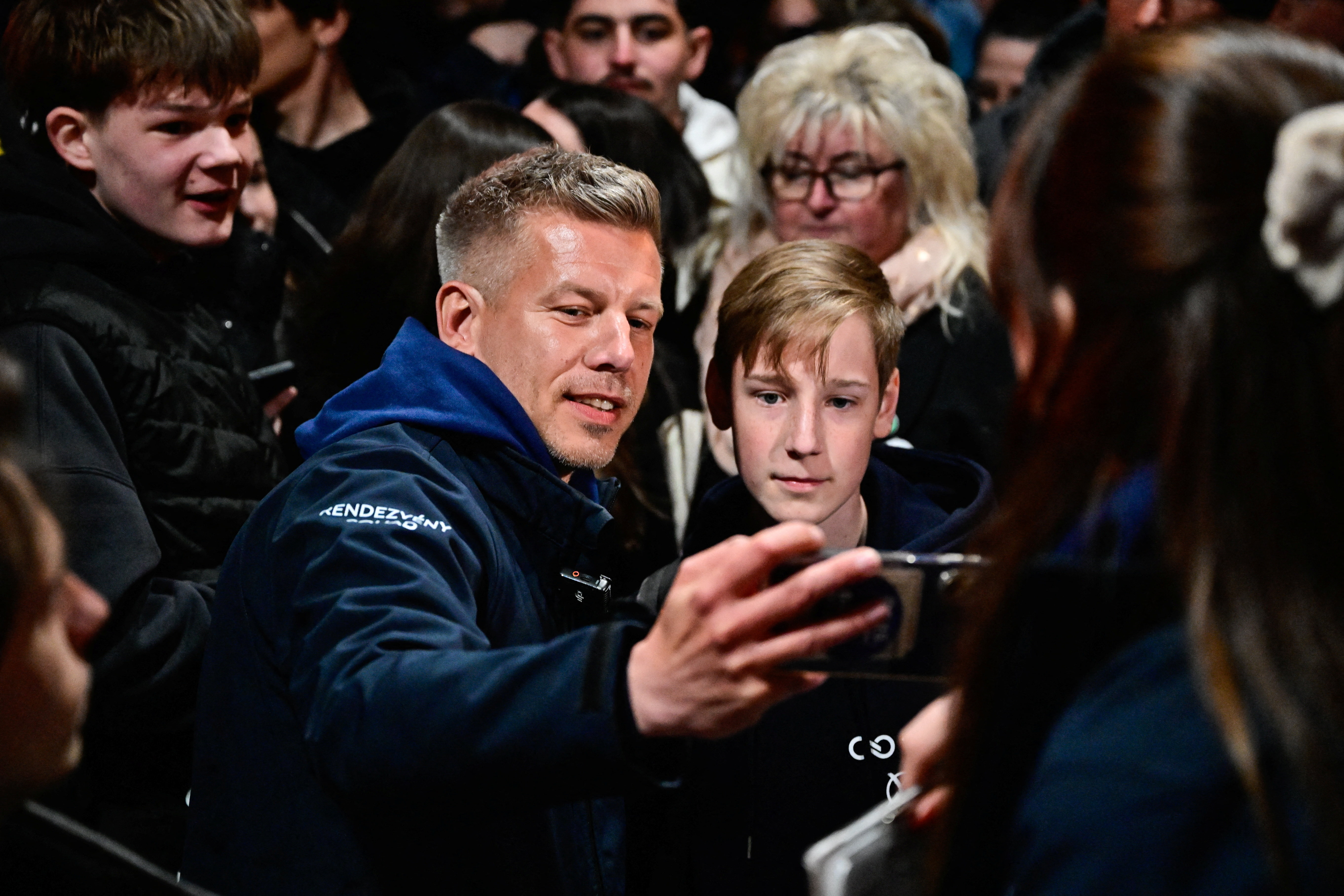 Peter Magyar, leader of the opposition Tisza Party, takes a selfie with a young supporter during his election campaign rally in Miskolc, Hungary, April 10, 2026. REUTERS/Marton Monus