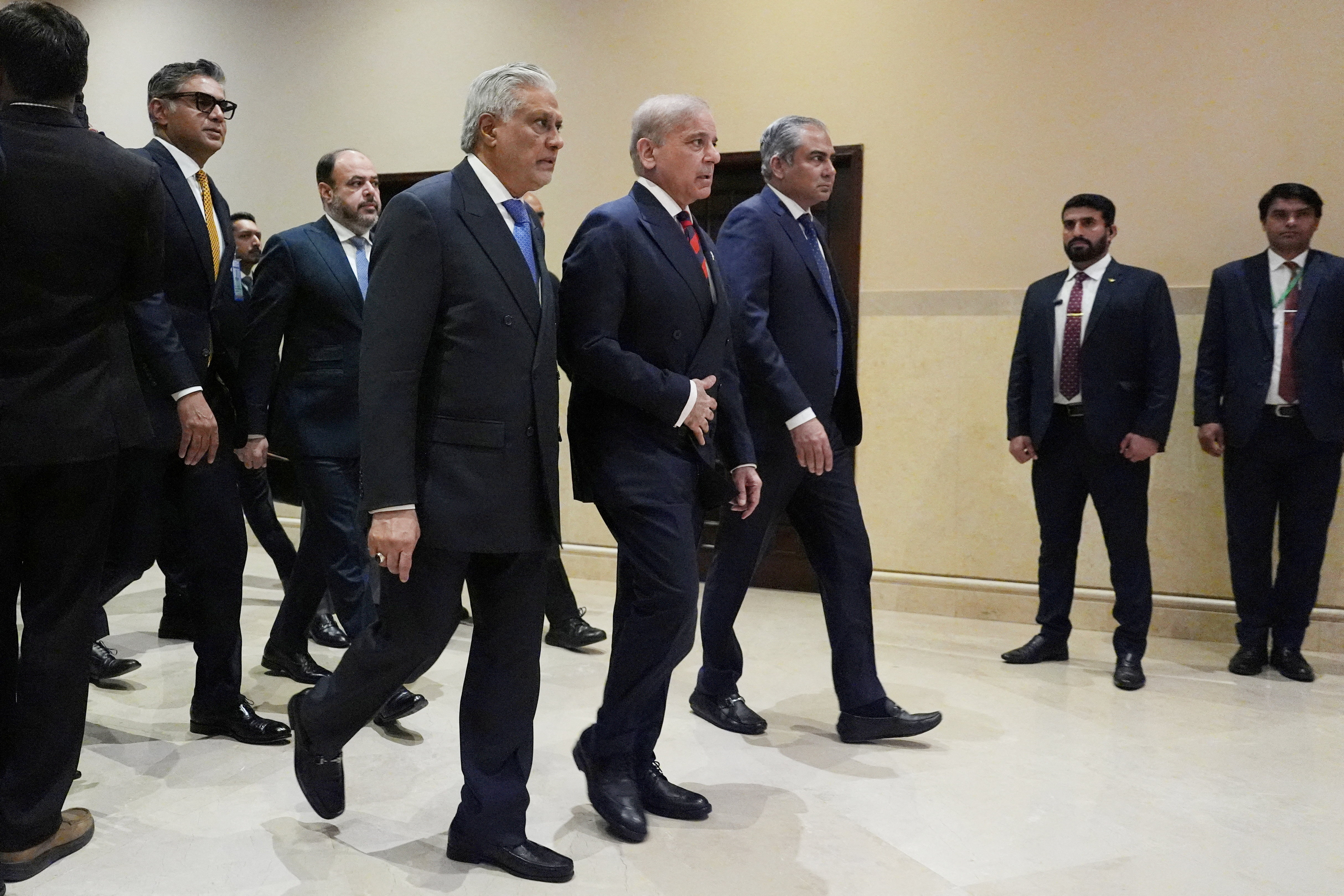 Pakistani Deputy Prime Minister and Foreign Minister Mohammad Ishaq Dar, Pakistan's Prime Minister Shehbaz Sharif, and Pakistan's Interior Minister Mohsin Naqvi, arrive for a meeting with U.S. Vice President JD Vance in Islamabad