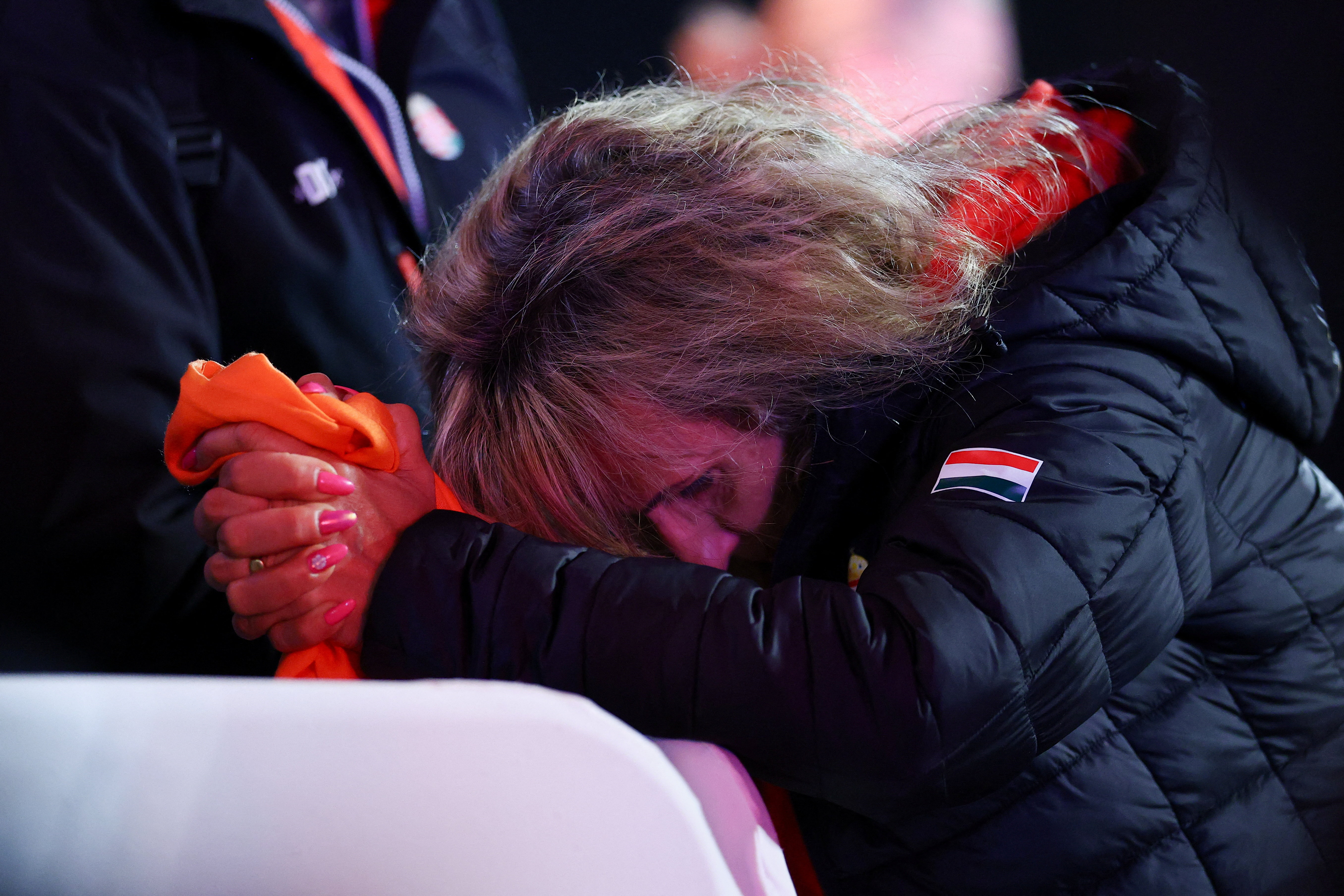 A supporter of the Fidesz Party reacts to partial results during the parliamentary election in Budapest, Hungary, April 12, 2026. REUTERS/Lisi Niesner