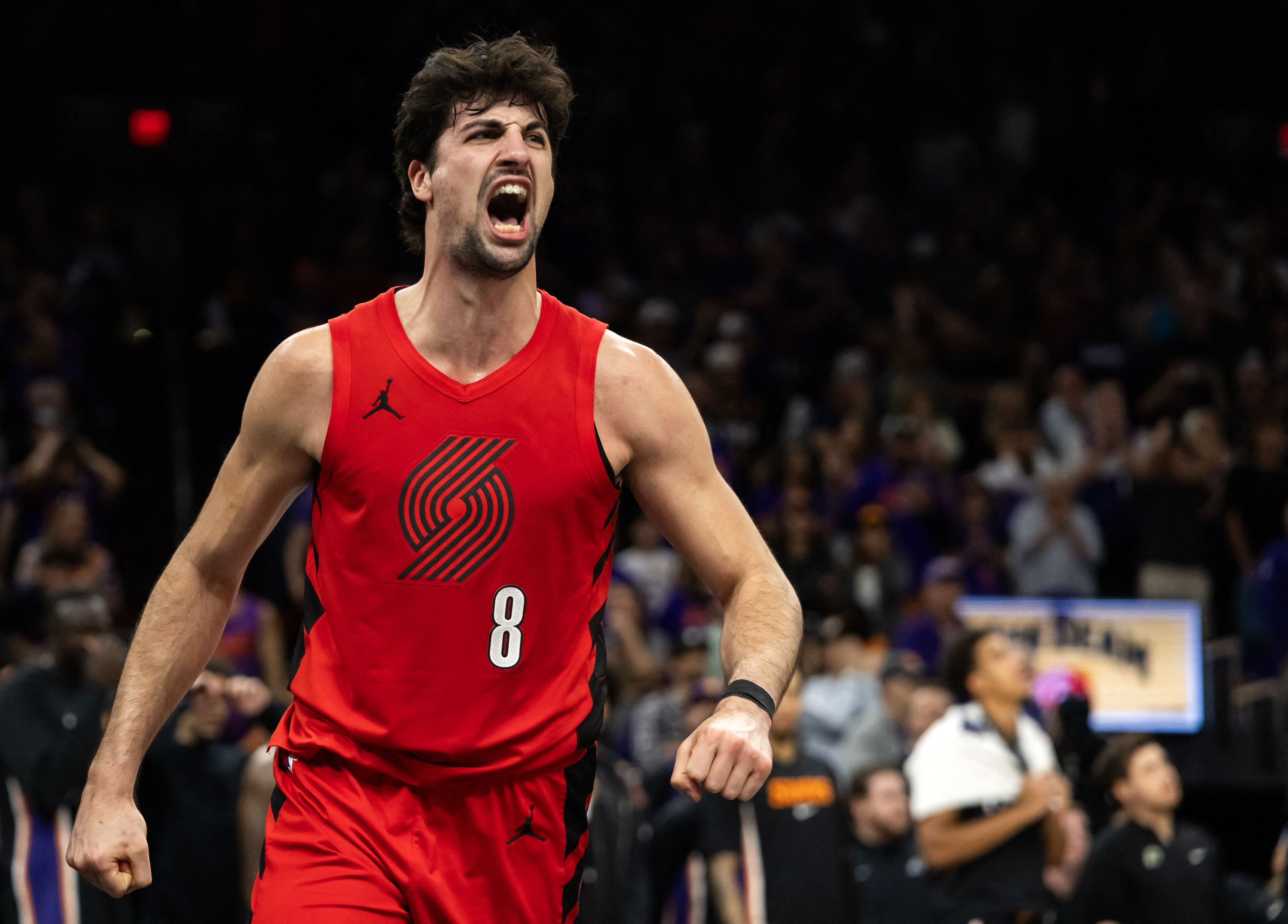 Apr 14, 2026; Phoenix, Arizona, USA; Portland Trail Blazers forward Deni Avdija (8) celebrates against the Phoenix Suns in the second half during the play-in rounds of the 2026 NBA Playoffs at Mortgage Matchup Center. Mandatory Credit: Mark J. Rebilas-Ima