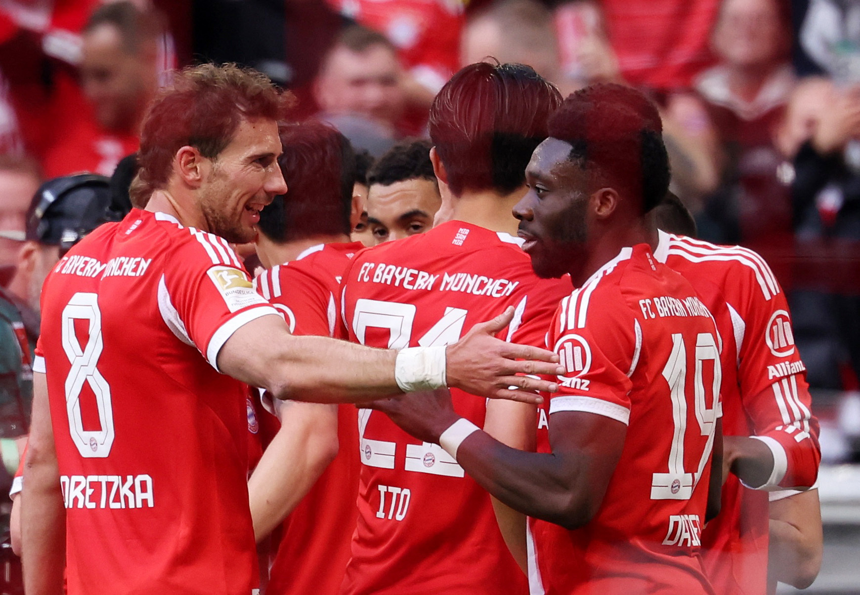 Soccer Football - Bundesliga - Bayern Munich v VfB Stuttgart - Allianz Arena, Munich, Germany - April 19, 2026 Bayern Munich's Alphonso Davies celebrates scoring their third goal with Leon Goretzka REUTERS/Gintare Karpaviciute DFL REGULATIONS PROHIBIT ANY
