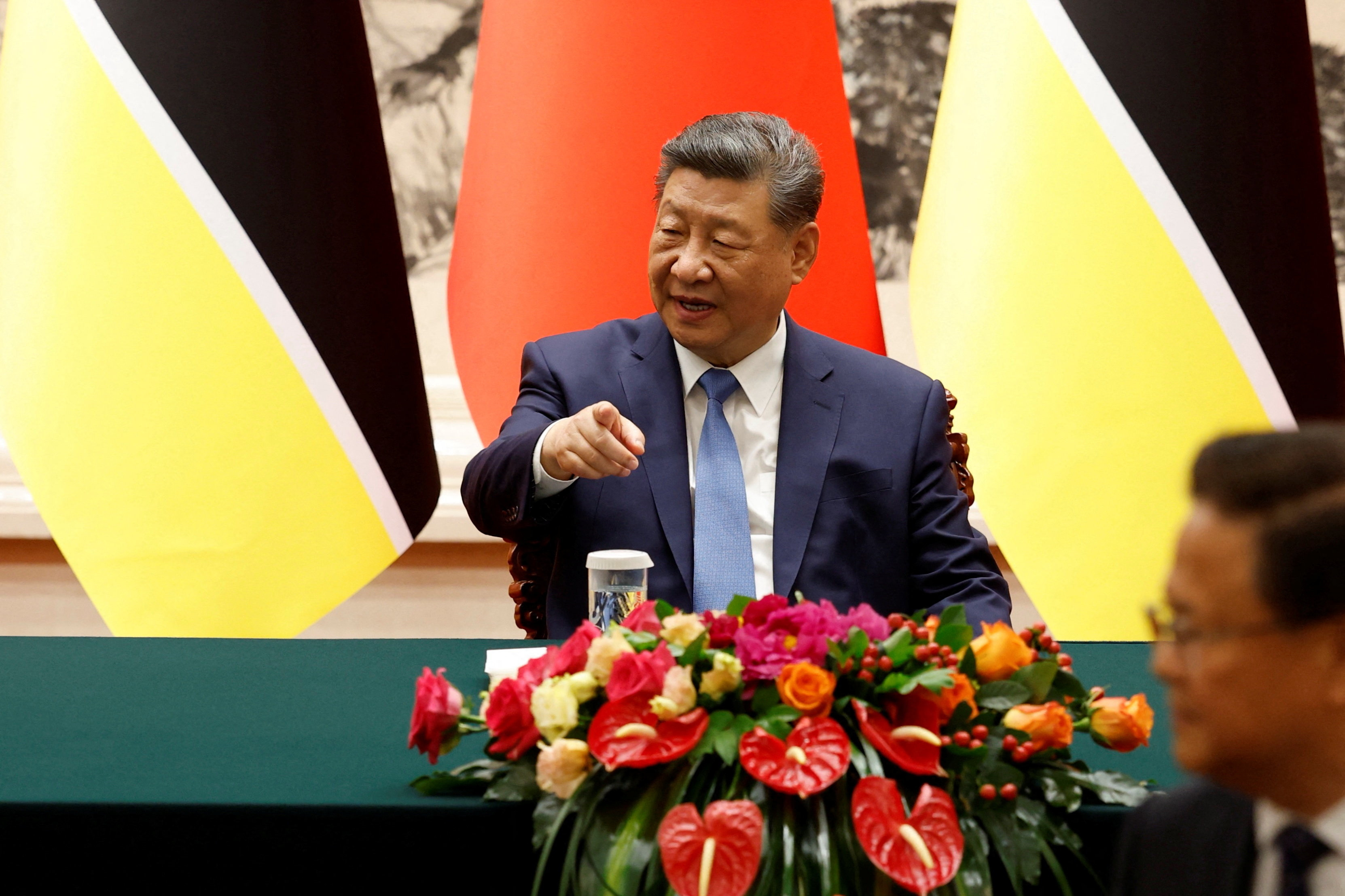 China's President Xi Jinping attends a signing ceremony with