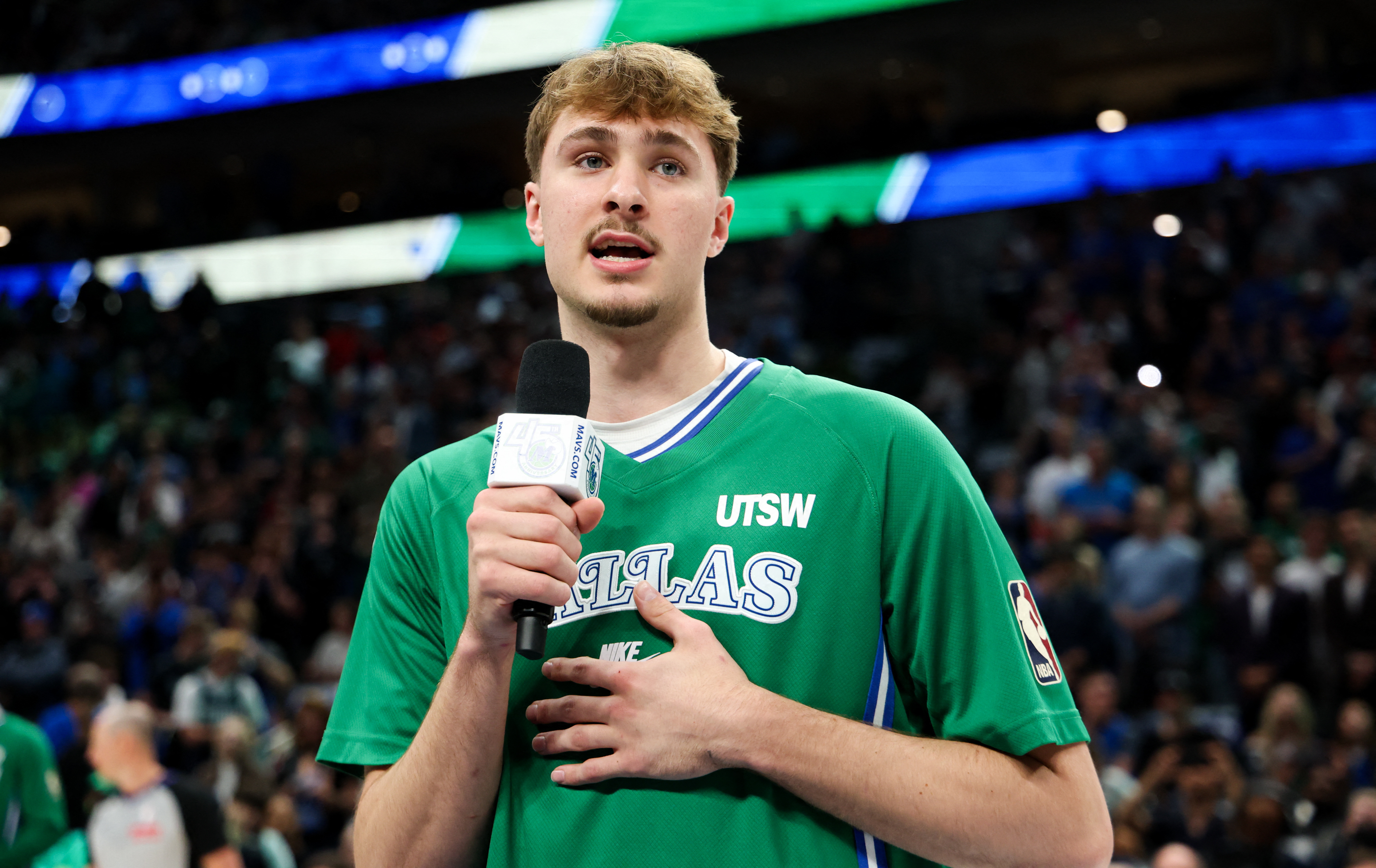 Apr 12, 2026; Dallas, Texas, USA;  Dallas Mavericks forward Cooper Flagg (32) speaks to the crowd before the game against the Chicago Bulls at American Airlines Center. Mandatory Credit: Kevin Jairaj-Imagn Images