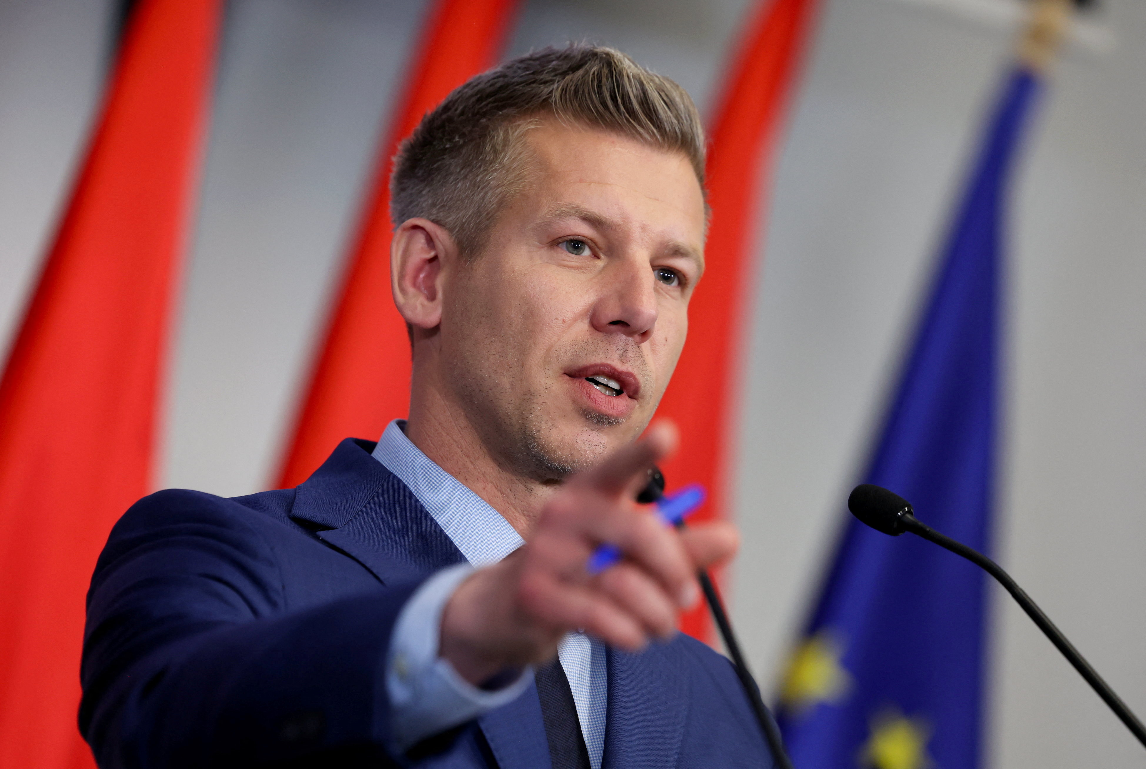 Election winner Peter Magyar speaks during a press conference
