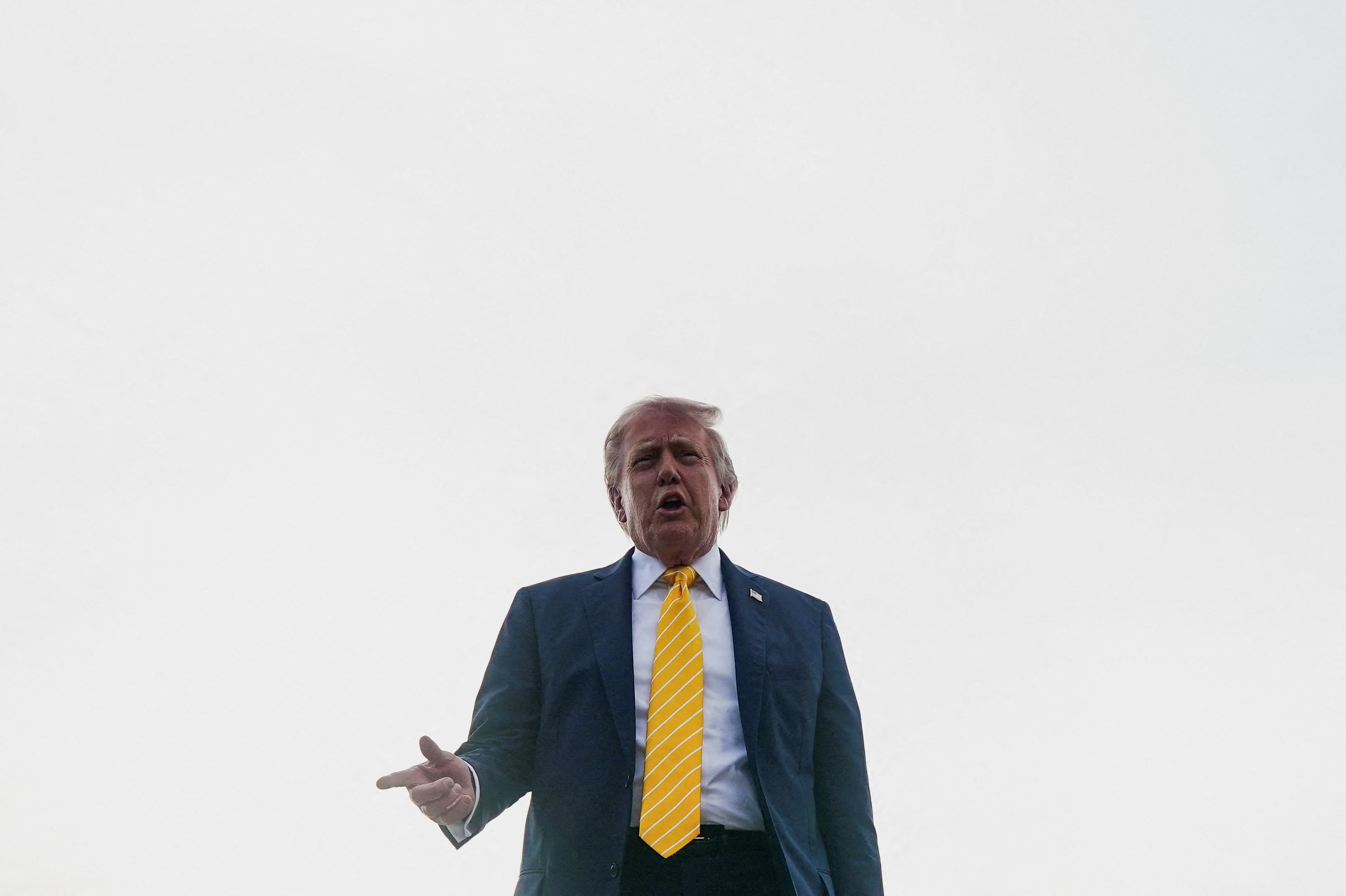 U.S. President Donald Trump speaks to the media before boarding Air Force One for departure to Miami, Florida, at Palm Beach International Airport in West Palm Beach, Florida, U.S., May 2, 2026. REUTERS/Nathan Howard