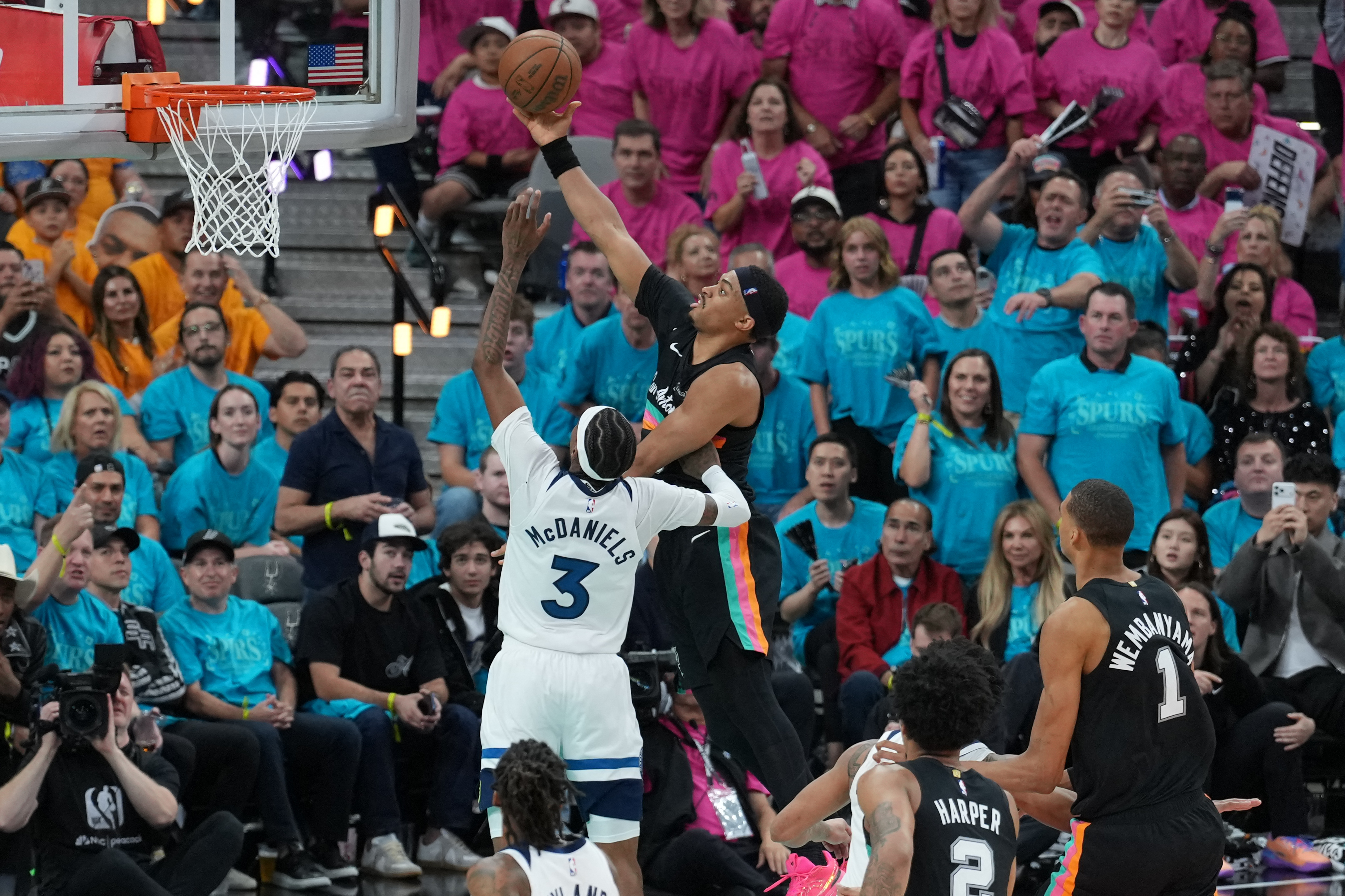 May 4, 2026; San Antonio, Texas, USA; San Antonio Spurs forward Keldon Johnson (3) shoots over Minnesota Timberwolves forward Jaden McDaniels (3) in the second half during game one of the second round of the 2026 NBA Playoffs at Frost Bank Center. Mandato