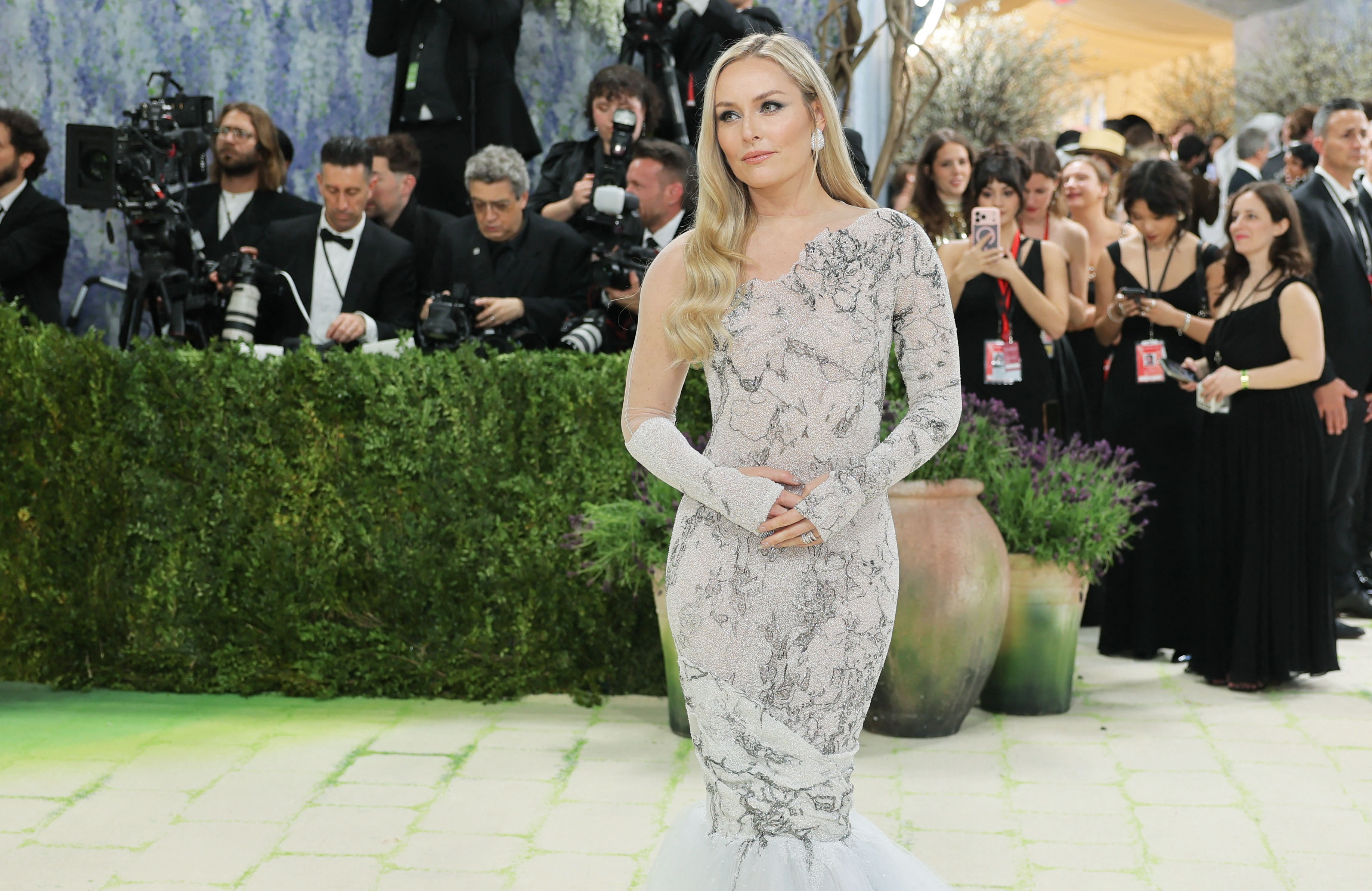 Lindsey Vonn poses during the Met Gala, an annual fundraising gala held for the benefit of the Metropolitan Museum of Art's Costume Institute with this year's theme 'Costume Art' in New York City, New York, U.S., May 4, 2026. REUTERS/Daniel Cole