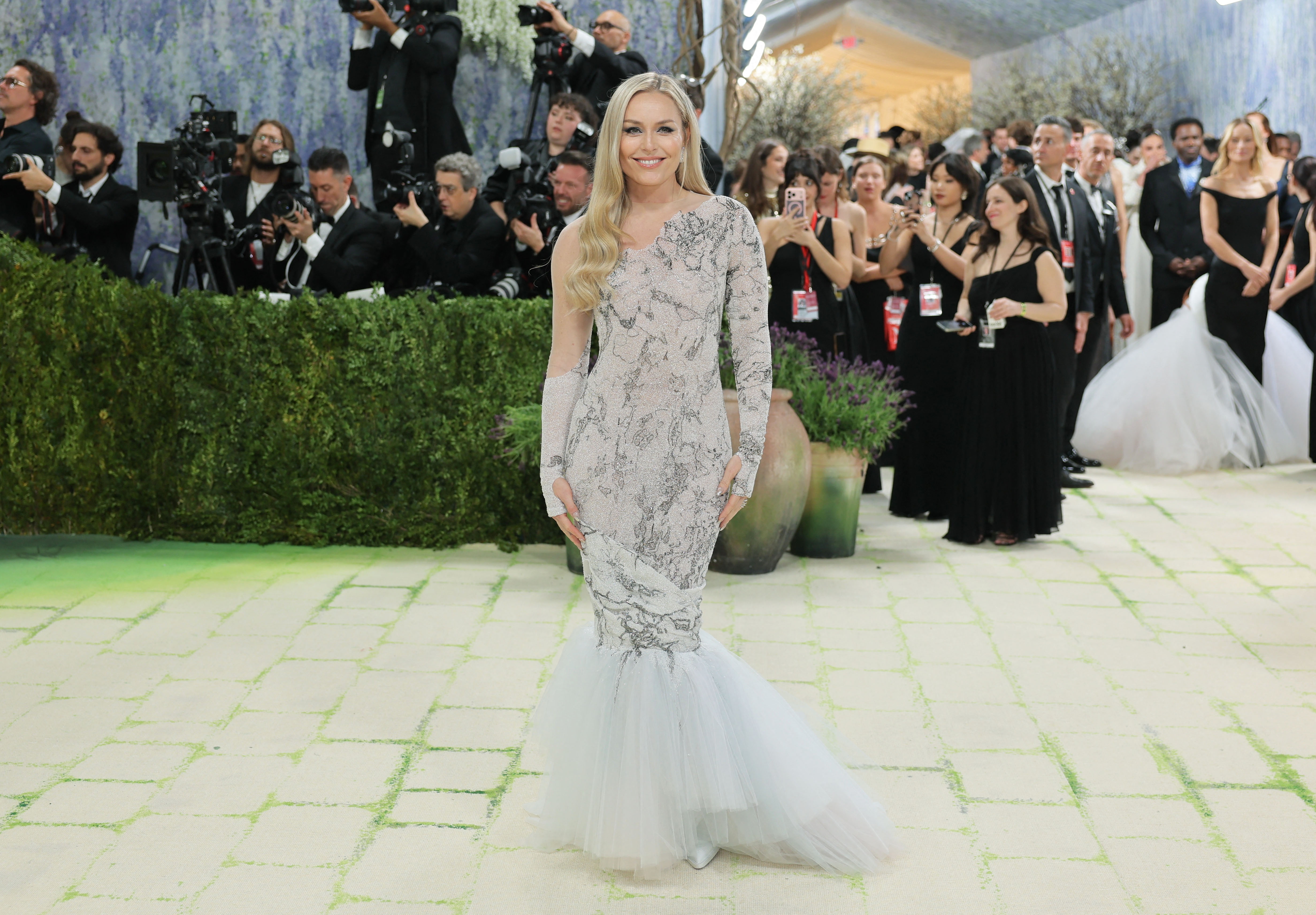 Lindsey Vonn poses during the Met Gala, an annual fundraising gala held for the benefit of the Metropolitan Museum of Art's Costume Institute with this year's theme 'Costume Art' in New York City, New York, U.S., May 4, 2026. REUTERS/Daniel Cole