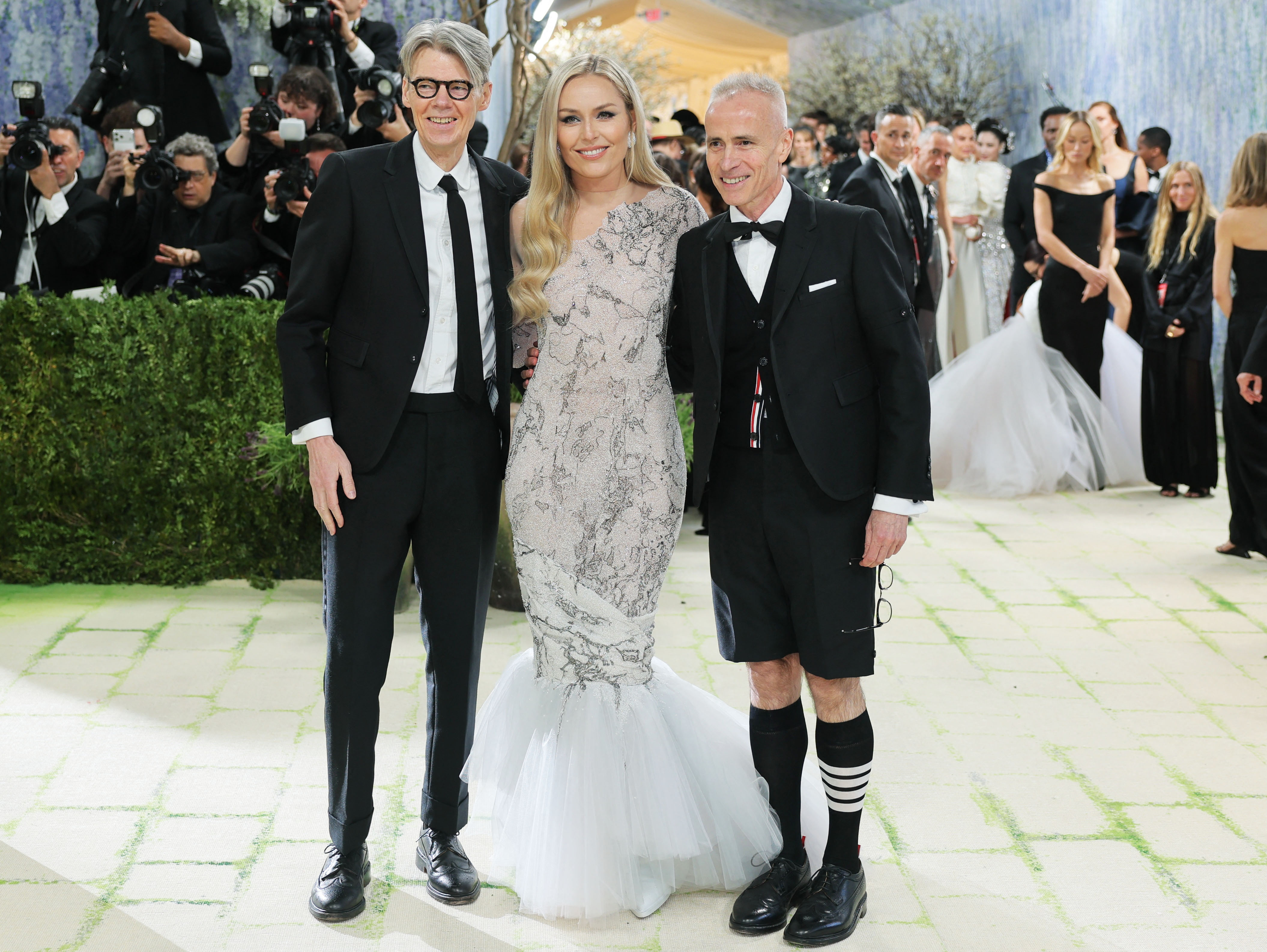 Head Curator of the Costume Institute at The Metropolitan Museum of Art, Andrew Bolton, Lindsey Vonn and Thom Browne pose during the Met Gala, an annual fundraising gala held for the benefit of the Metropolitan Museum of Art's Costume Institute with this