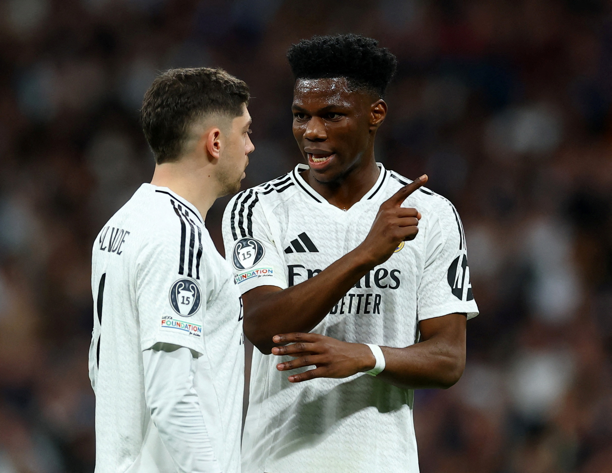 FILE PHOTO: Soccer Football - Champions League - Knockout Phase Playoff - Second Leg - Real Madrid v Manchester City - Santiago Bernabeu, Madrid, Spain - February 19, 2025 Real Madrid's Federico Valverde and Aurelien Tchouameni Action Images via Reuters/M