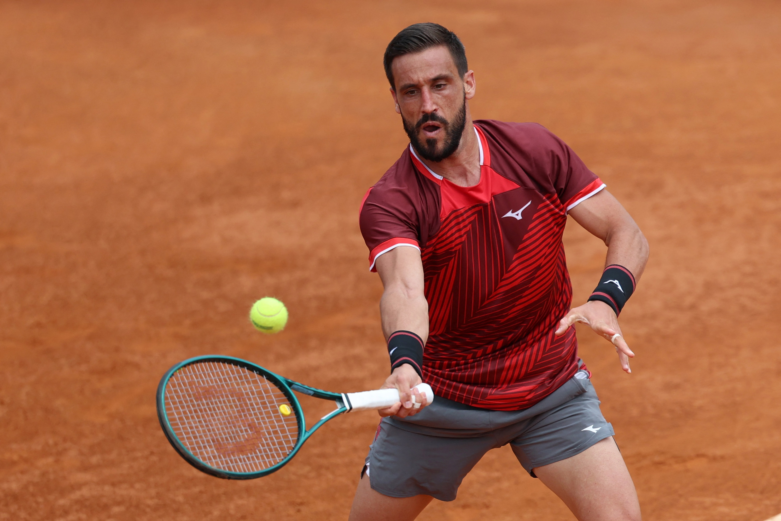 Tennis - Italian Open - Foro Italico, Rome, Italy - May 6, 2026 Bosnia and Herzegovina's Damir Dzumhur in action during his first round match against France's Adrian Mannarino REUTERS/Claudia Greco