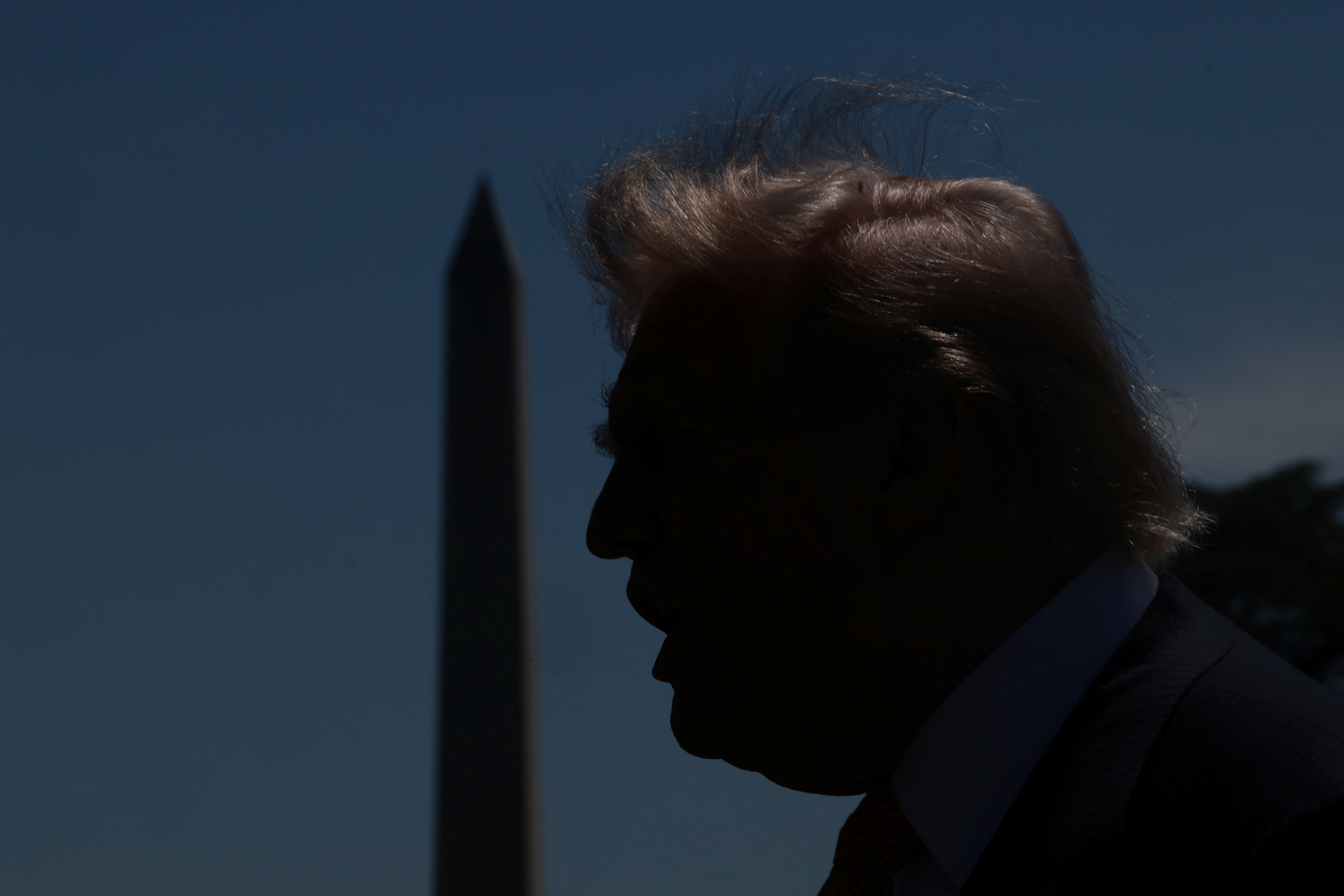 U.S. President Donald Trump speaks to the press