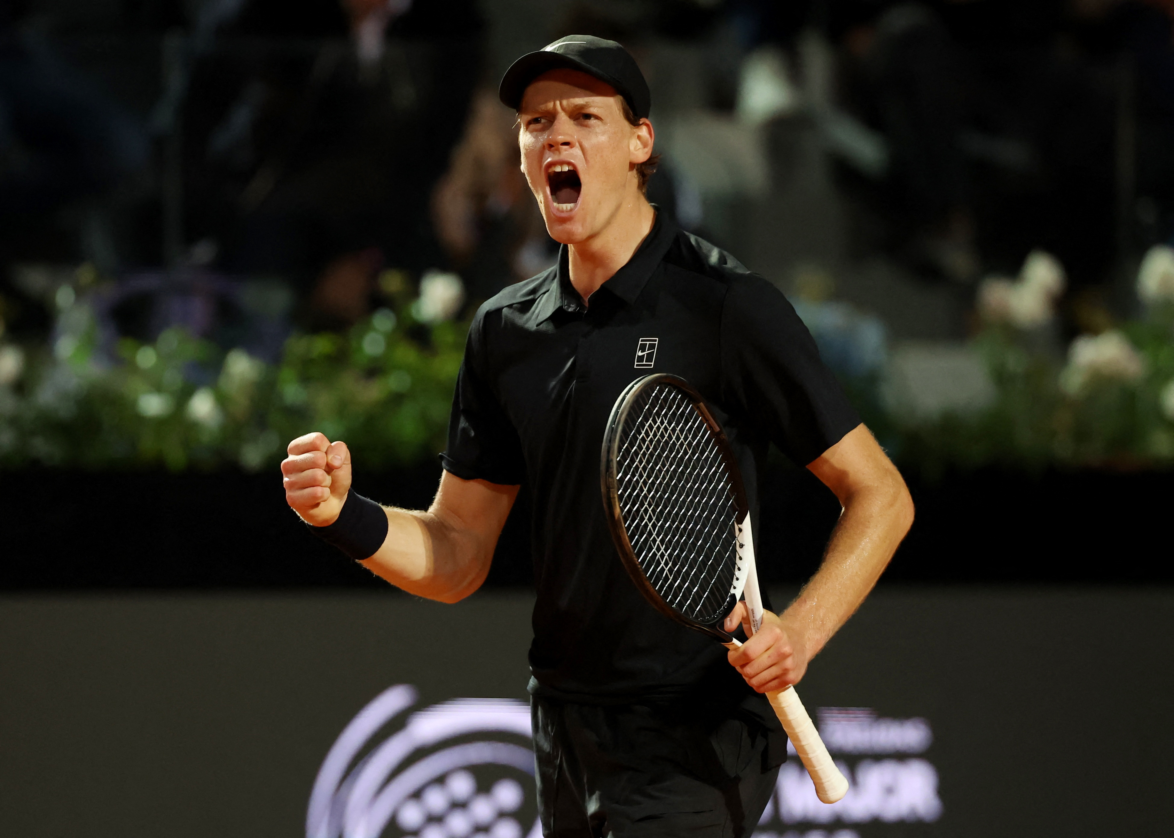 Tennis - Italian Open - Foro Italico, Rome, Italy - May 15, 2026 Italy's Jannik Sinner reacts during his semi final match against Russia's Daniil Medvedev REUTERS/Ciro De Luca