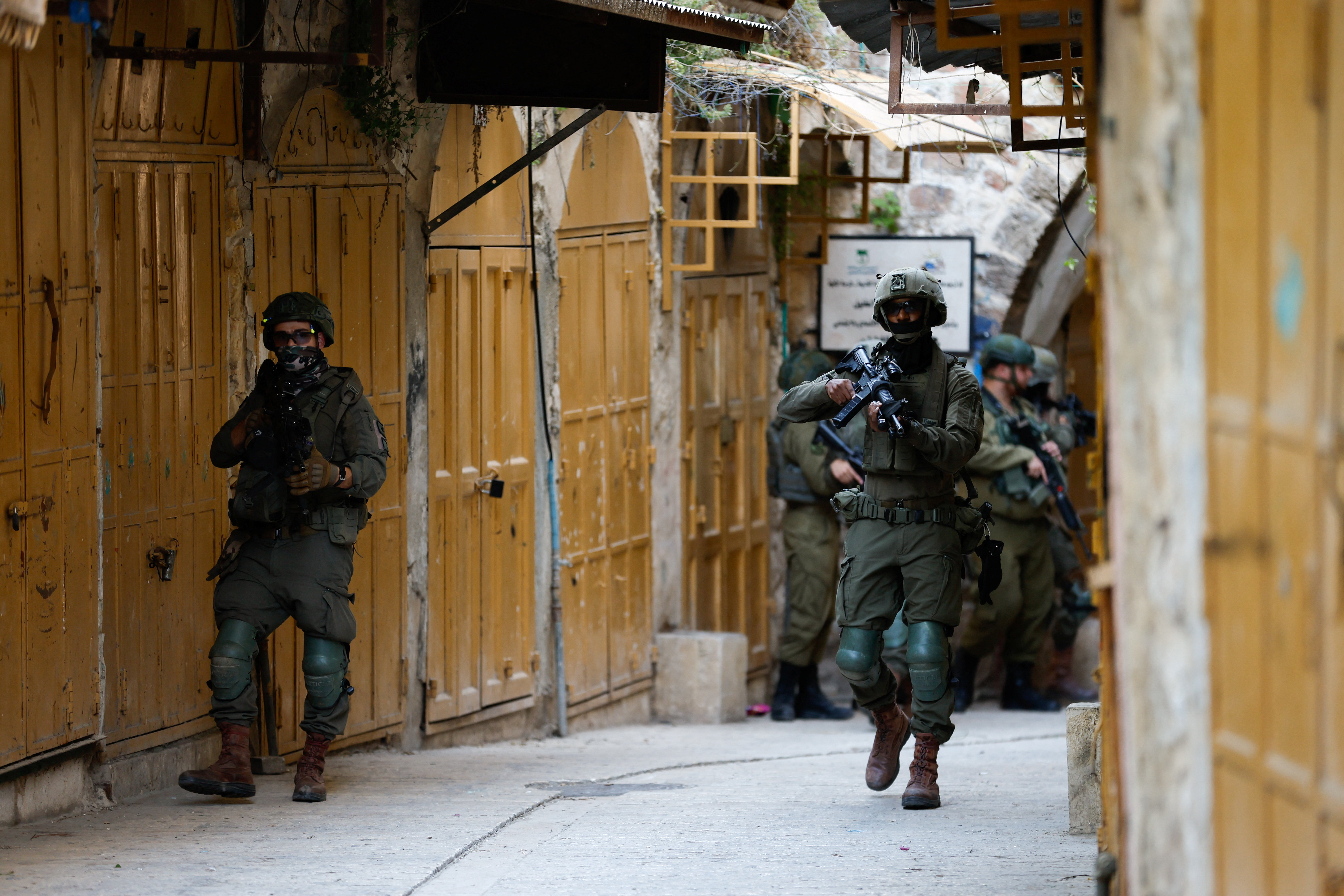 2026-05-23T143252Z_858470417_RC21FLAVG40I_RTRMADP_3_ISRAEL-PALESTINIANS-HEBRON-SETTLERS