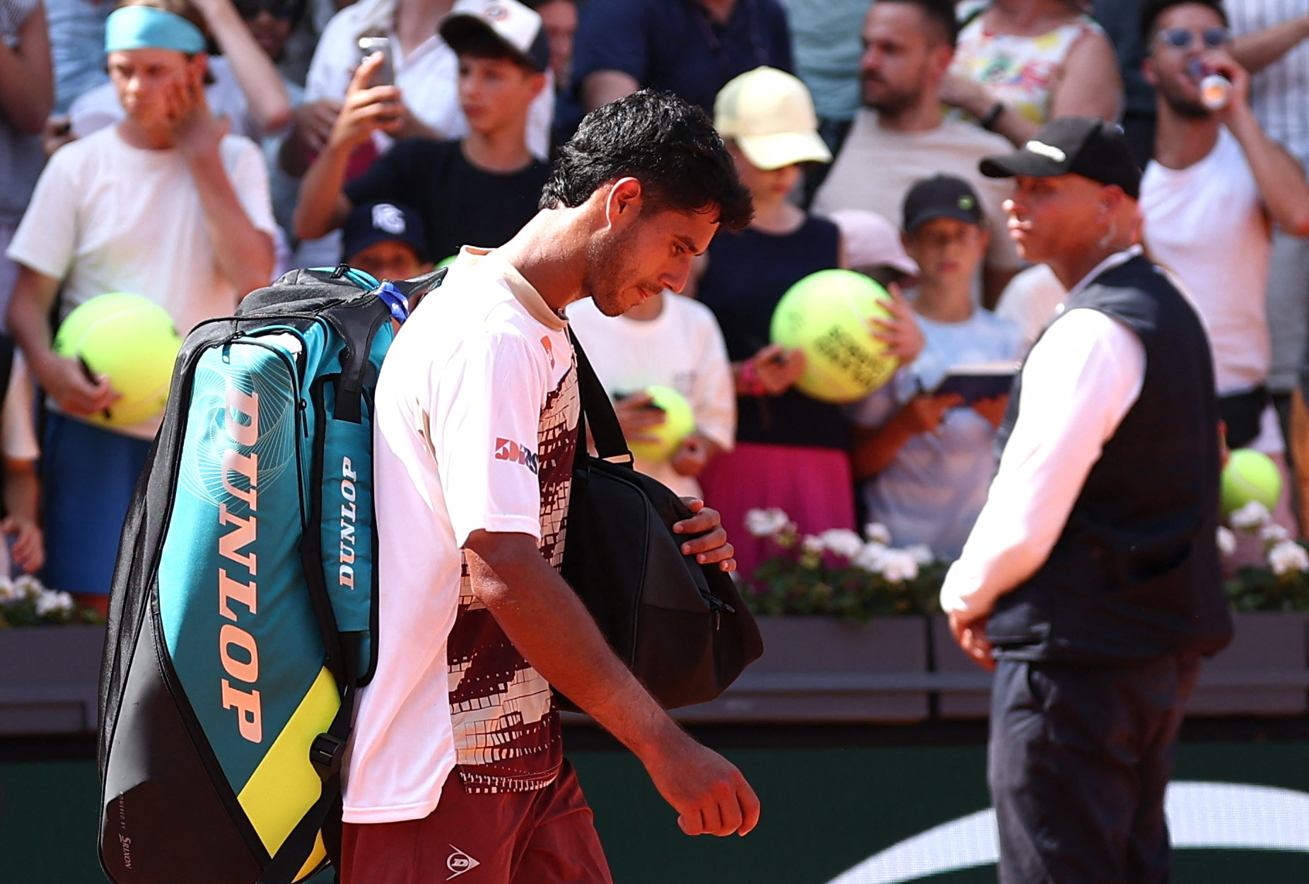 Tennis - French Open - Roland Garros, Paris, France - May 28, 2026 Paraguay's Adolfo Daniel Vallejo looks dejected as he leaves the court after losing his second round match against France's Moise Kouame REUTERS/Guglielmo Mangiapane