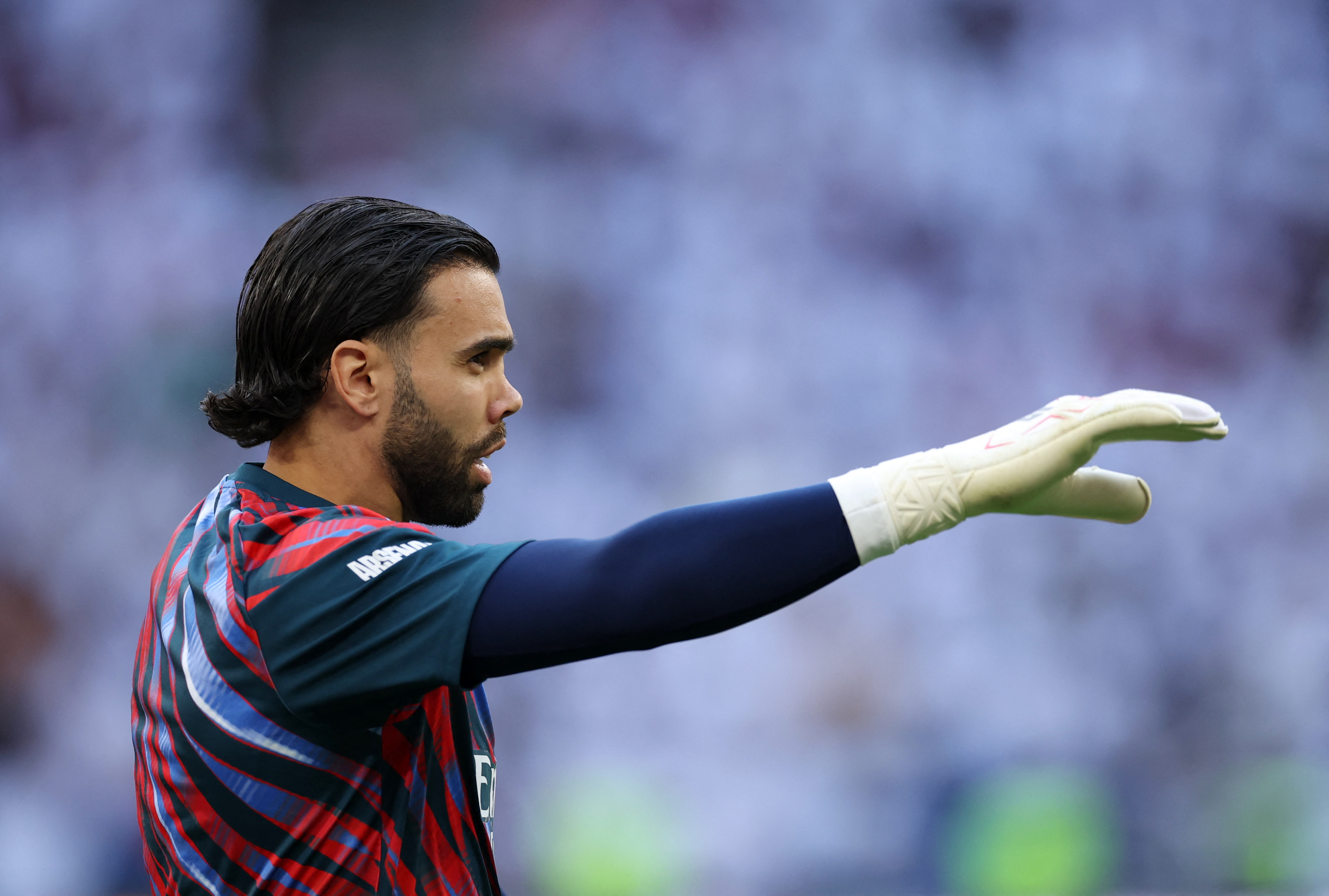Soccer Football - UEFA Champions League - Final - Paris St Germain v Arsenal - Puskas Arena, Budapest, Hungary - May 30, 2026 Arsenal's David Raya during the warm up before the match REUTERS/Andrew Boyers