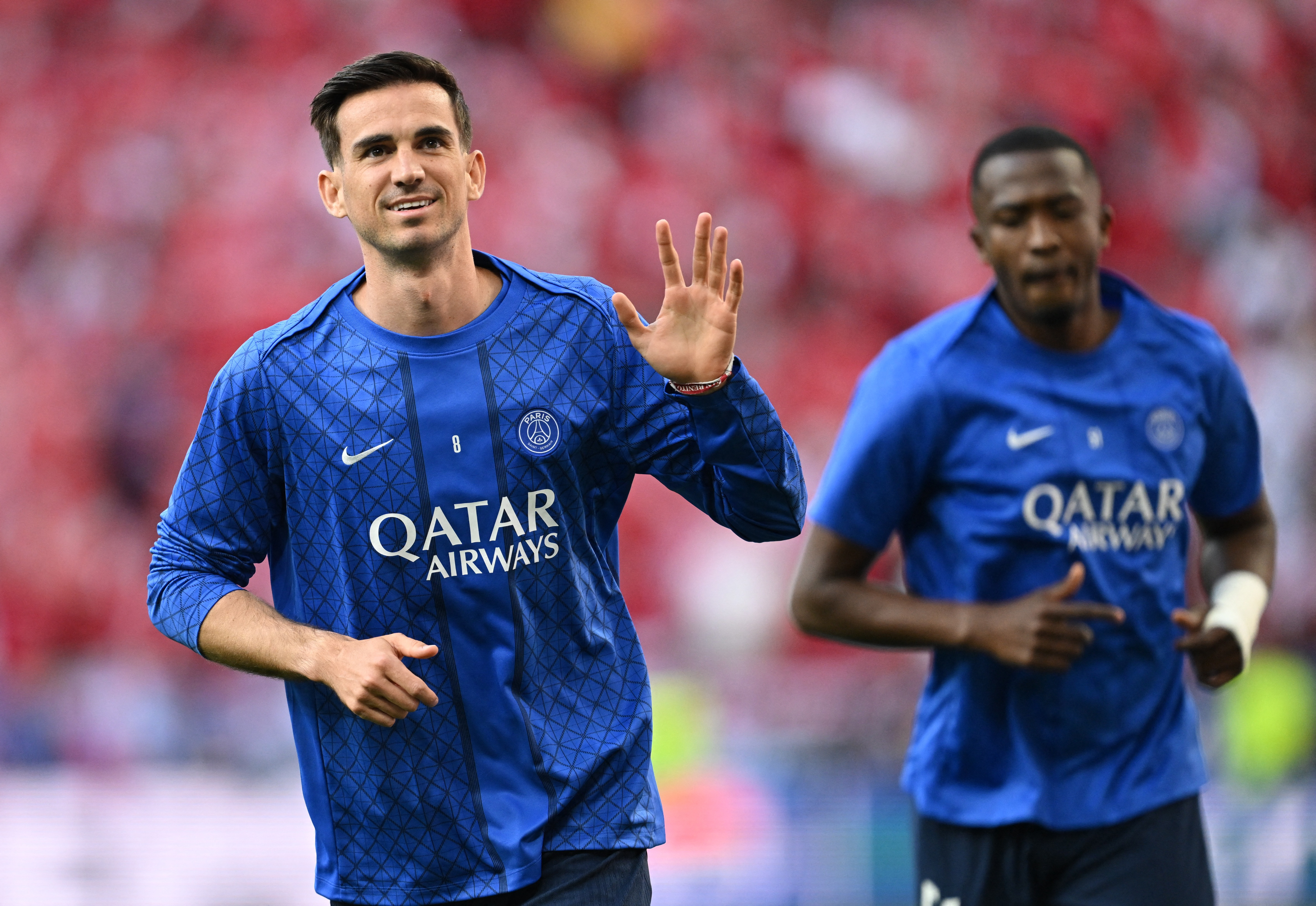 2026-05-Soccer Football - UEFA Champions League - Final - Paris St Germain v Arsenal - Puskas Arena, Budapest, Hungary - May 30, 2026 Paris St Germain's Fabian Ruiz and Willian Pacho during the warm up before the match REUTERS/Angeli-CHAMPIONS-PSG-ARS.JPG