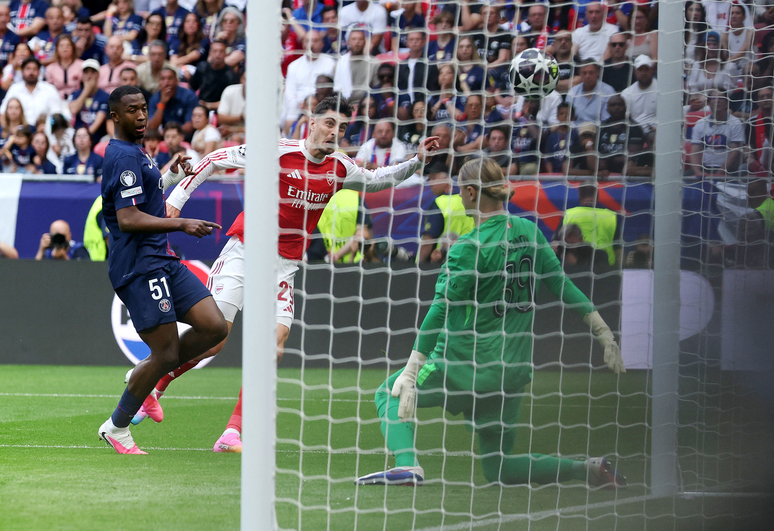 Soccer Football - UEFA Champions League - Final - Paris St Germain v Arsenal - Puskas Arena, Budapest, Hungary - May 30, 2026 Arsenal's Kai Havertz scores their first goal past Paris St Germain's Matvey Safonov REUTERS/Phil Noble