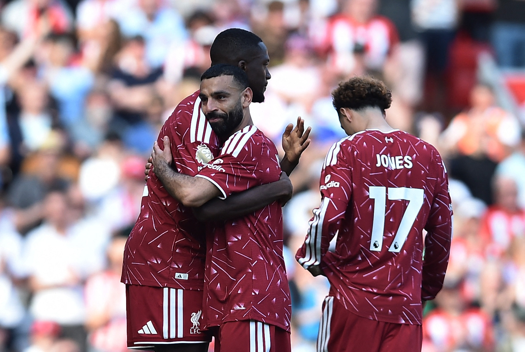 Soccer Football - Premier League - Liverpool v Brentford - Anfield, Liverpool, Britain - May 24, 2026 Liverpool's Mohamed Salah embraces Ibrahima Konate as he walks off the pitch after being substituted REUTERS/Peter Powell EDITORIAL USE ONLY. NO USE WITH