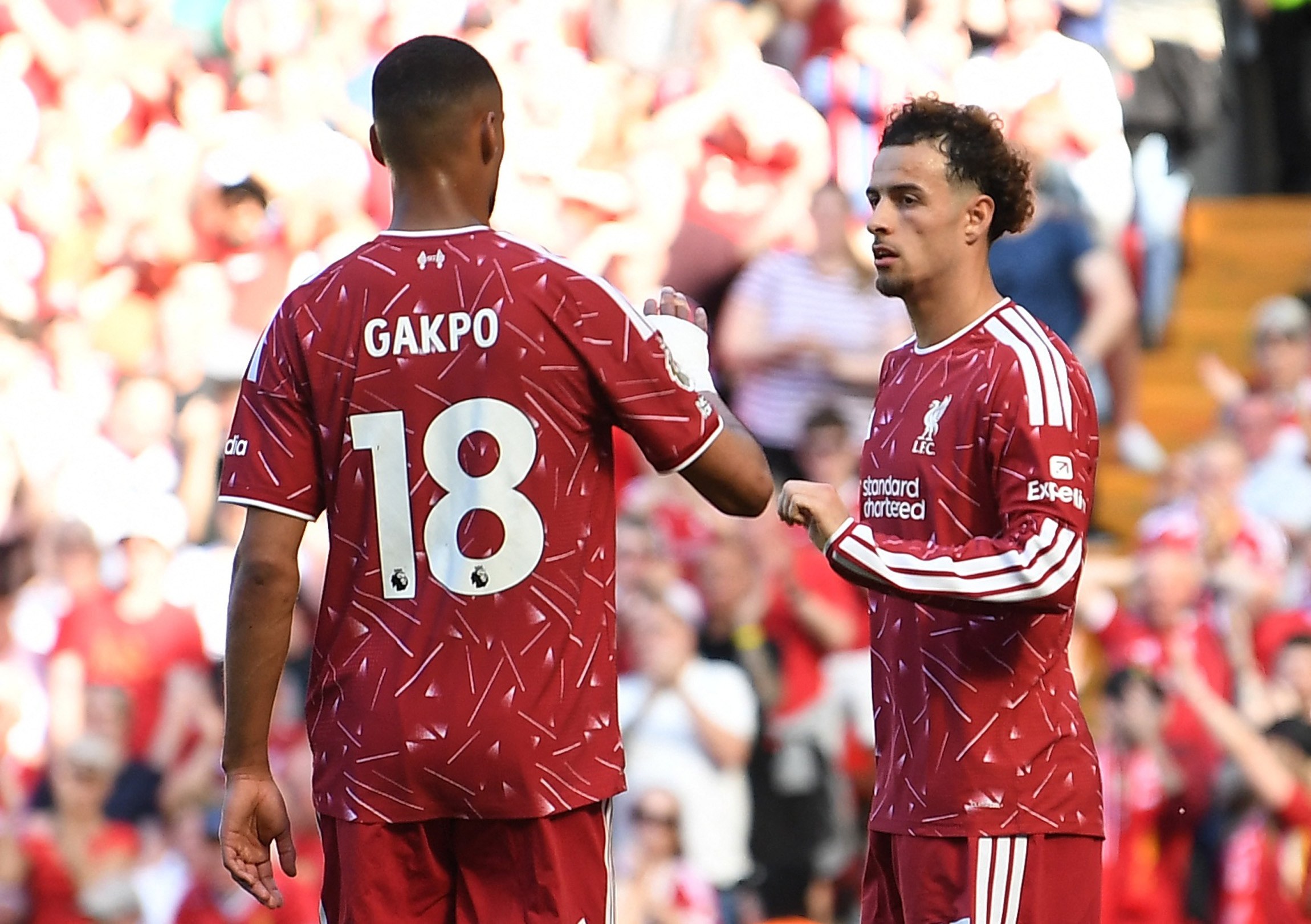 Soccer Football - Premier League - Liverpool v Brentford - Anfield, Liverpool, Britain - May 24, 2026 Liverpool's Curtis Jones celebrates scoring their first goal with Cody Gakpo REUTERS/Peter Powell EDITORIAL USE ONLY. NO USE WITH UNAUTHORIZED AUDIO, VID