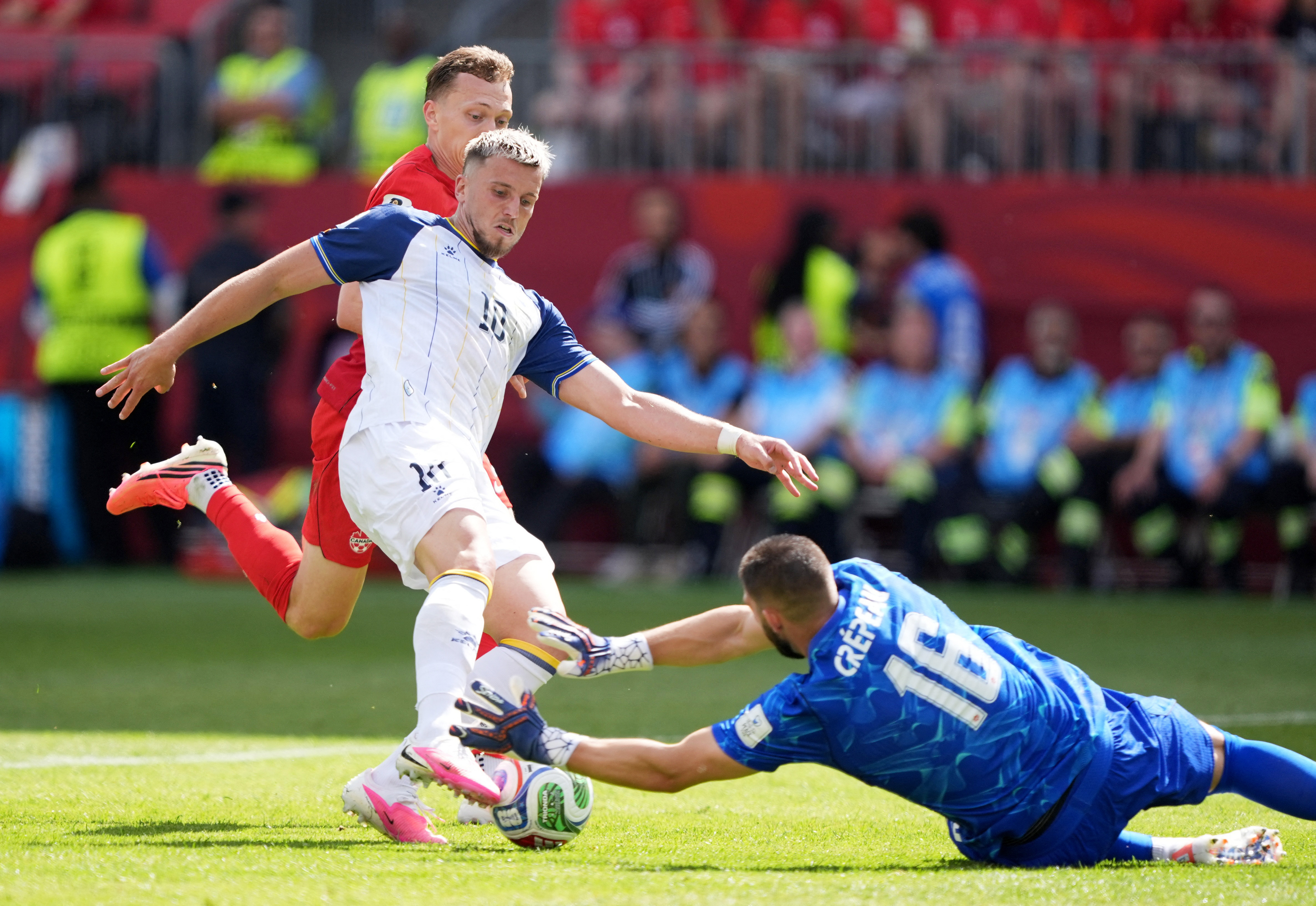 Soccer Football - FIFA World Cup 2026 - Group B - Canada v Bosnia and Herzegovina - Toronto Stadium, Toronto, Canada - June 12, 2026 Bosnia and Herzegovina's Ermedin Demirovic in action with Canada's Maxime Crepeau and Alistair Johnston IMAGN IMAGES via R
