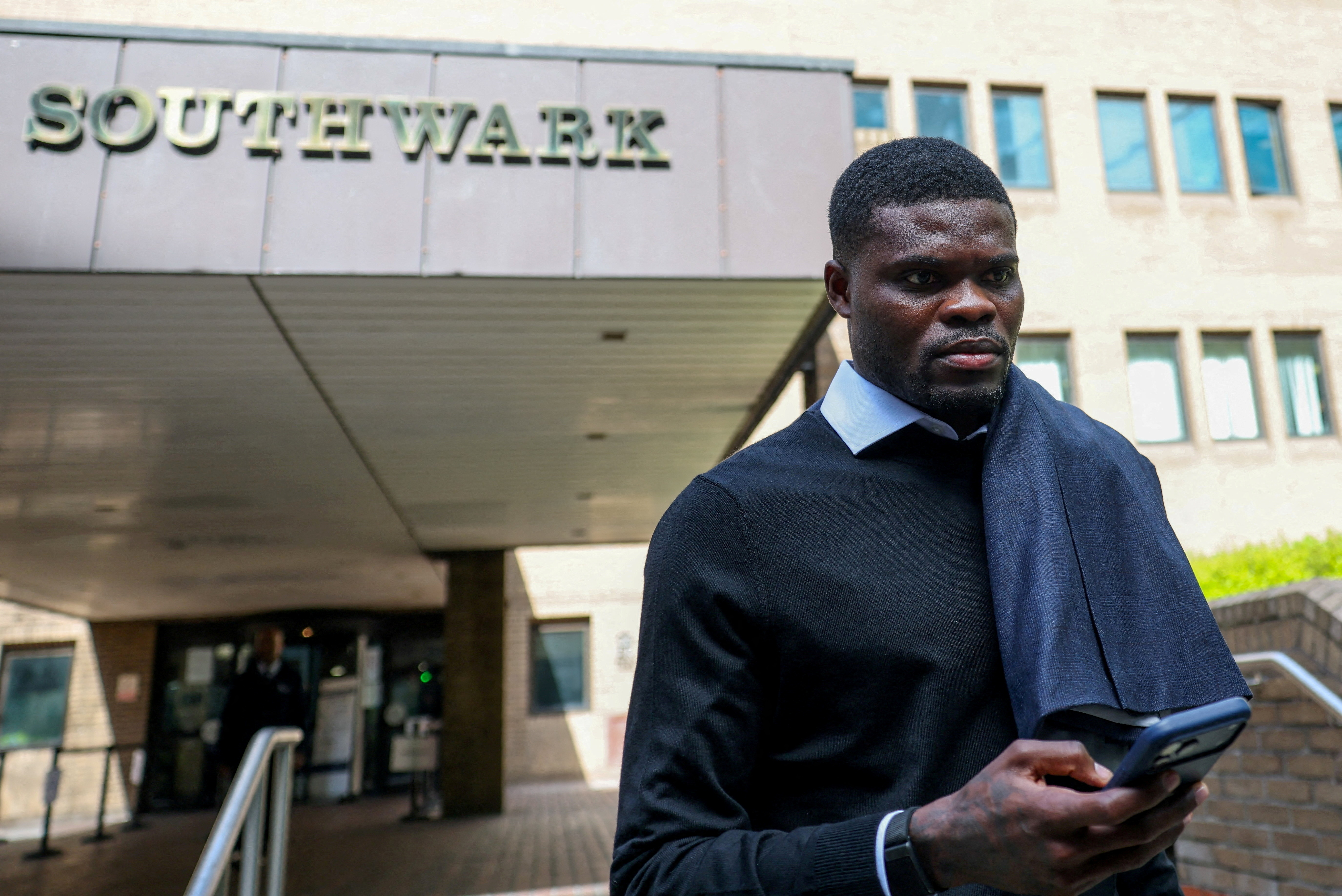 FILE PHOTO: Ghana national team and Villarreal midfielder Thomas Partey, who is facing two additional counts of rape and has pleaded not guilty to five counts of rape and one count of sexual assault, leaves the Southwark Crown Court in London, Britain, Ap