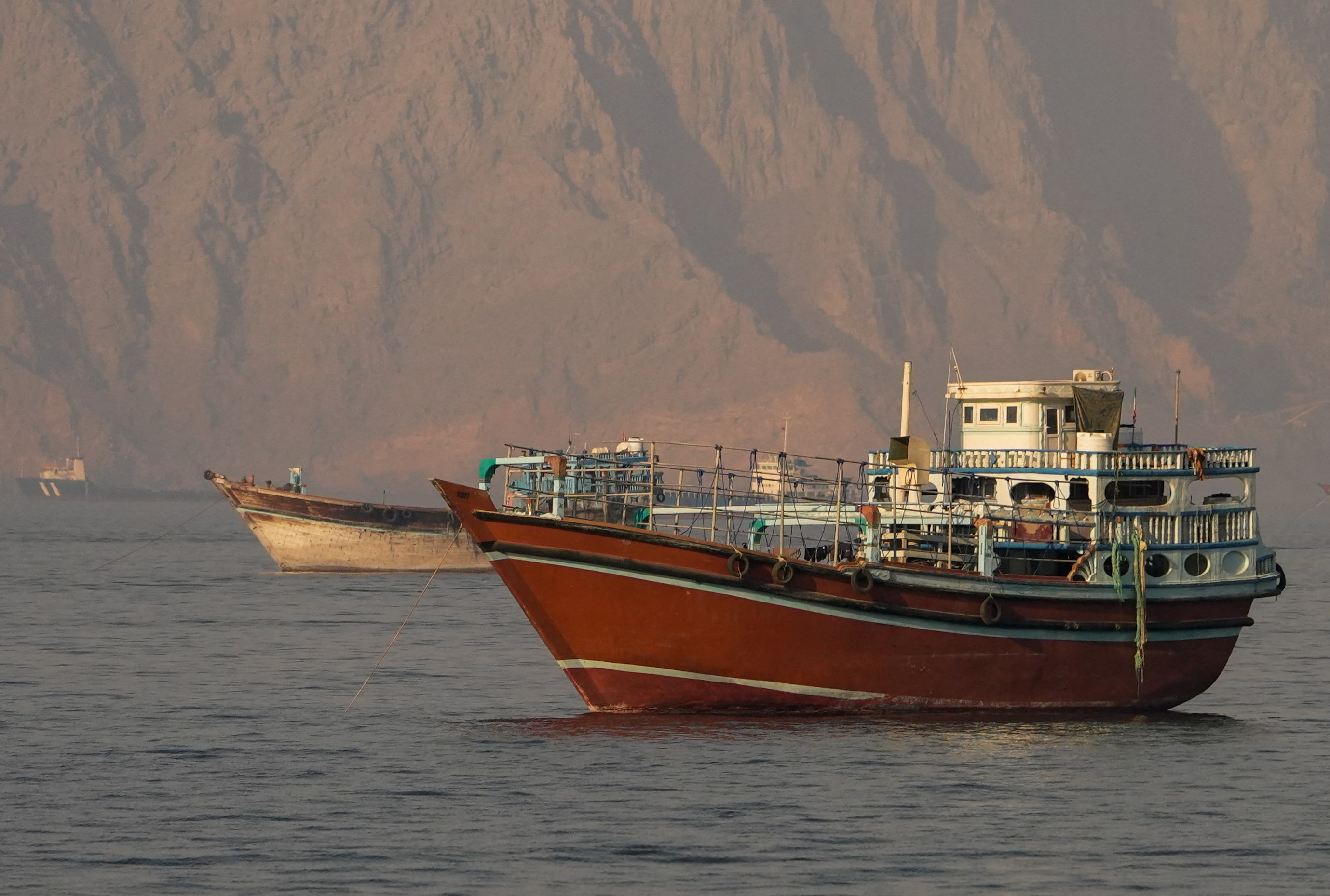 Vessels at the Strait of Hormuz, as seen from Musandam, Oman, June 14, 2026. REUTERS/Stringer