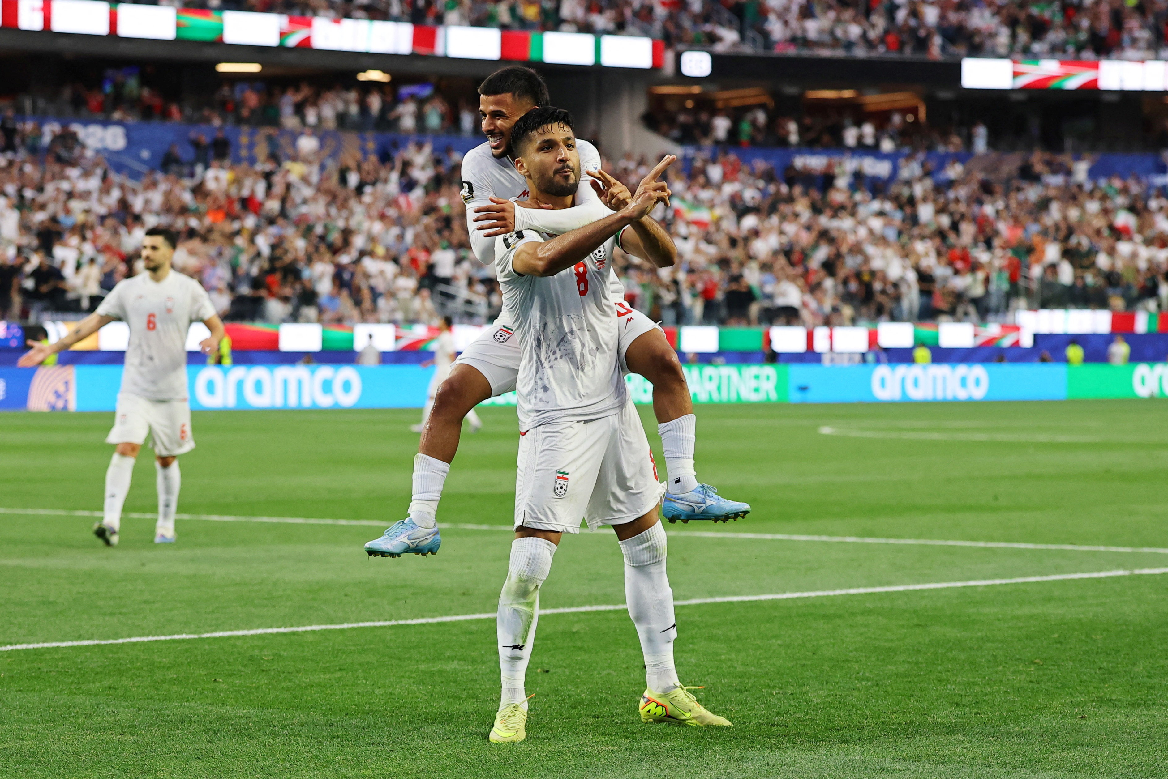 Soccer Football - FIFA World Cup 2026 - Group G - Iran v New Zealand - Los Angeles Stadium, Inglewood, California, U.S. - June 15, 2026 Iran's Mohammad Mohebbi celebrates scoring their second goal with Mehdi Ghayedi REUTERS/Daniel Cole     TPX IMAGES OF T