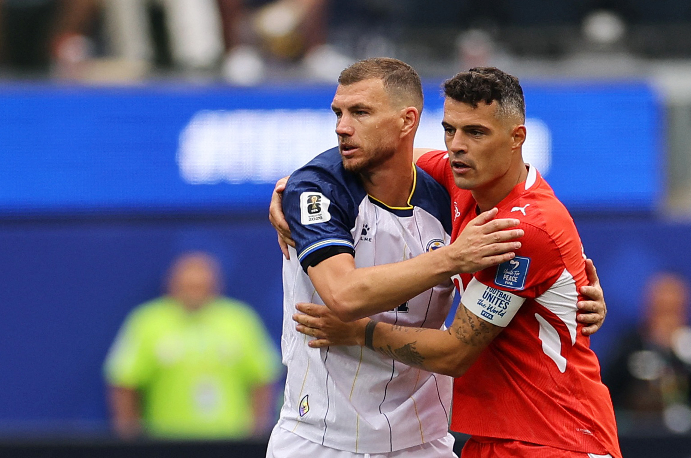 Soccer Football - FIFA World Cup 2026 - Group B - Switzerland v Bosnia and Herzegovina - Los Angeles Stadium, Inglewood, California, U.S. - June 18, 2026 Bosnia and Herzegovina's Edin Dzeko and Switzerland's Granit Xhaka REUTERS/Daniel Cole