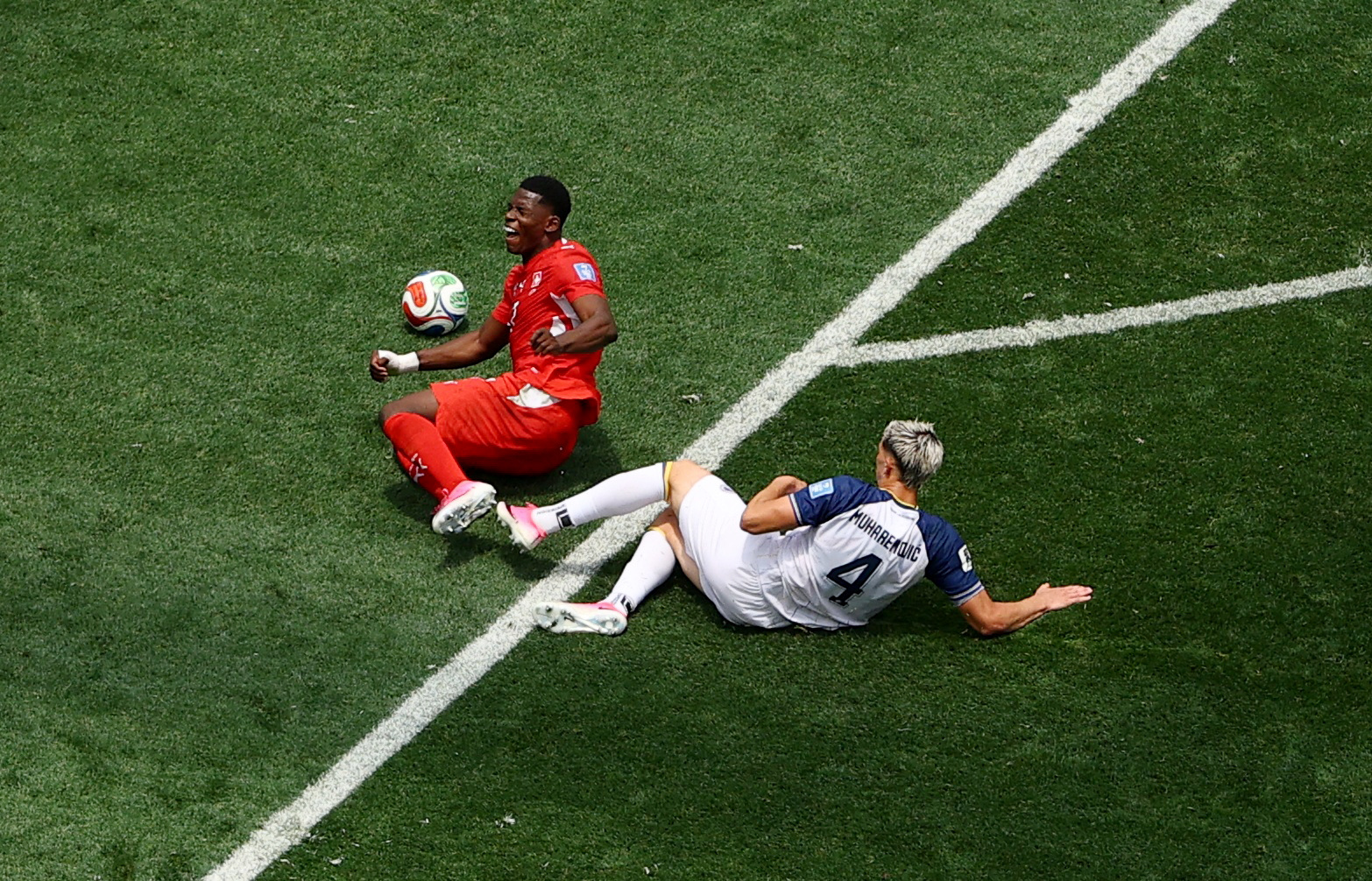 Soccer Football - FIFA World Cup 2026 - Group B - Switzerland v Bosnia and Herzegovina - Los Angeles Stadium, Inglewood, California, U.S. - June 18, 2026 Bosnia and Herzegovina's Tarik Muharemovic fouls Switzerland's Breel Embolo leading to a red card REU