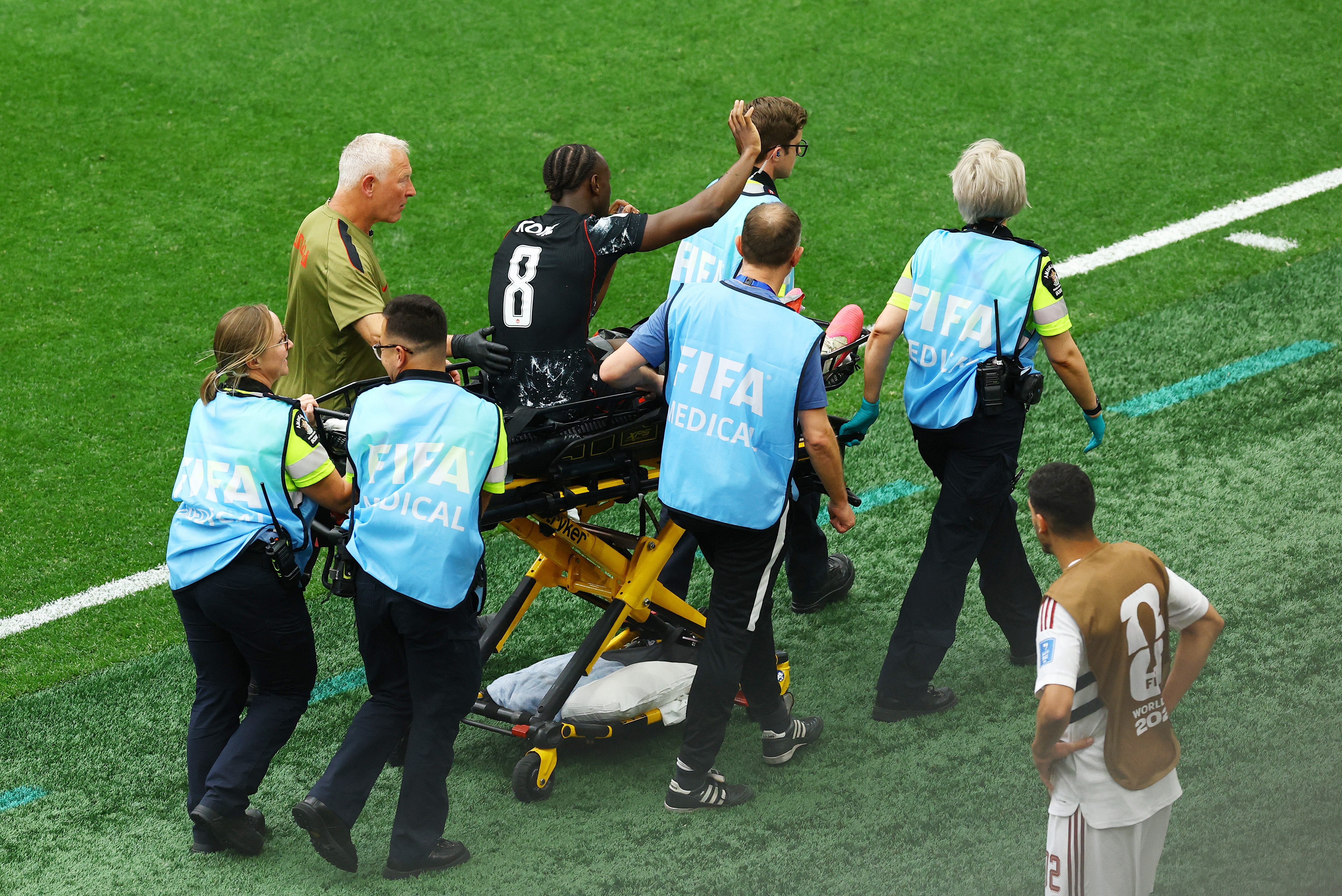 Soccer Football - FIFA World Cup 2026 - Group B - Canada v Qatar - BC Place, Vancouver, Canada - June 18, 2026 Canada's Ismael Kone is stretchered off after sustaining an injury REUTERS/Albert Gea