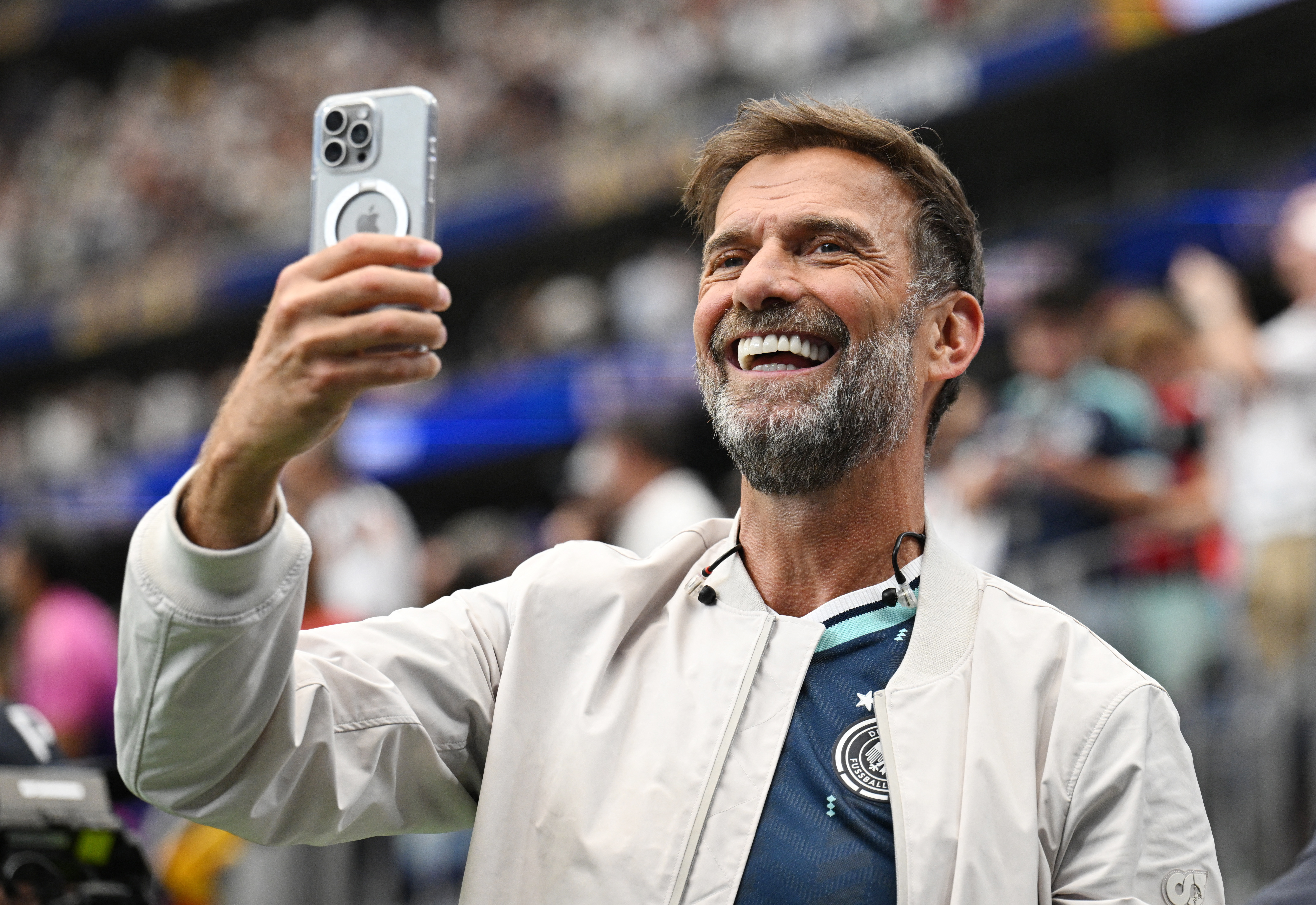 Soccer Football - FIFA World Cup 2026 - Group E - Germany v Curacao - Houston Stadium, Houston, Texas, U.S. - June 14, 2026 Red Bull's Global Head of Soccer Juergen Klopp takes a photograph inside the stadium after the match REUTERS/Annegret Hilse