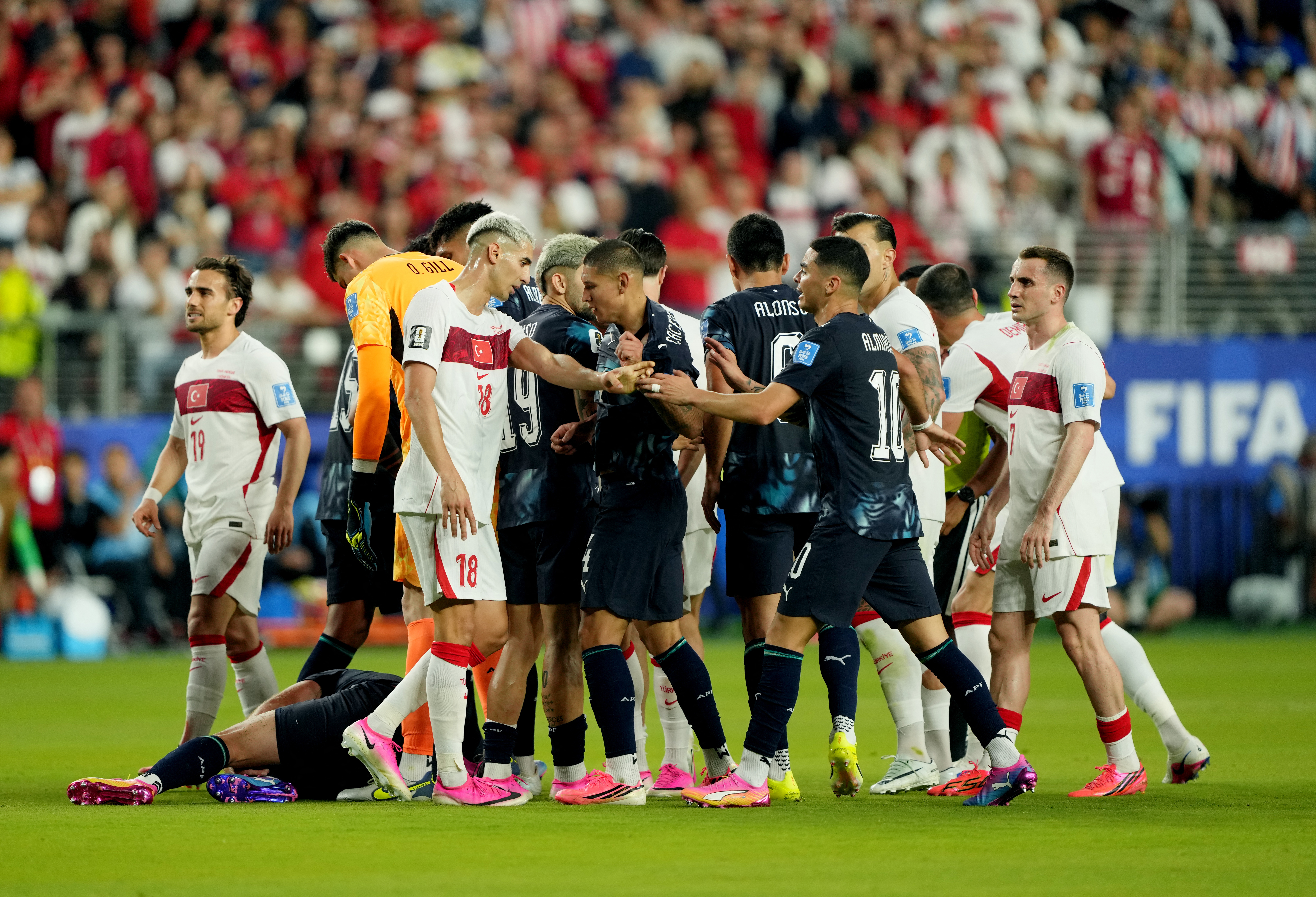 Soccer Football - FIFA World Cup 2026 - Group D - Turkey v Paraguay - San Francisco Bay Area Stadium, Santa Clara, California, U.S. - June 19, 2026 Paraguay's Miguel Almiron clashes with Turkey's Mert Muldur before being shown a red card by referee Ivan B