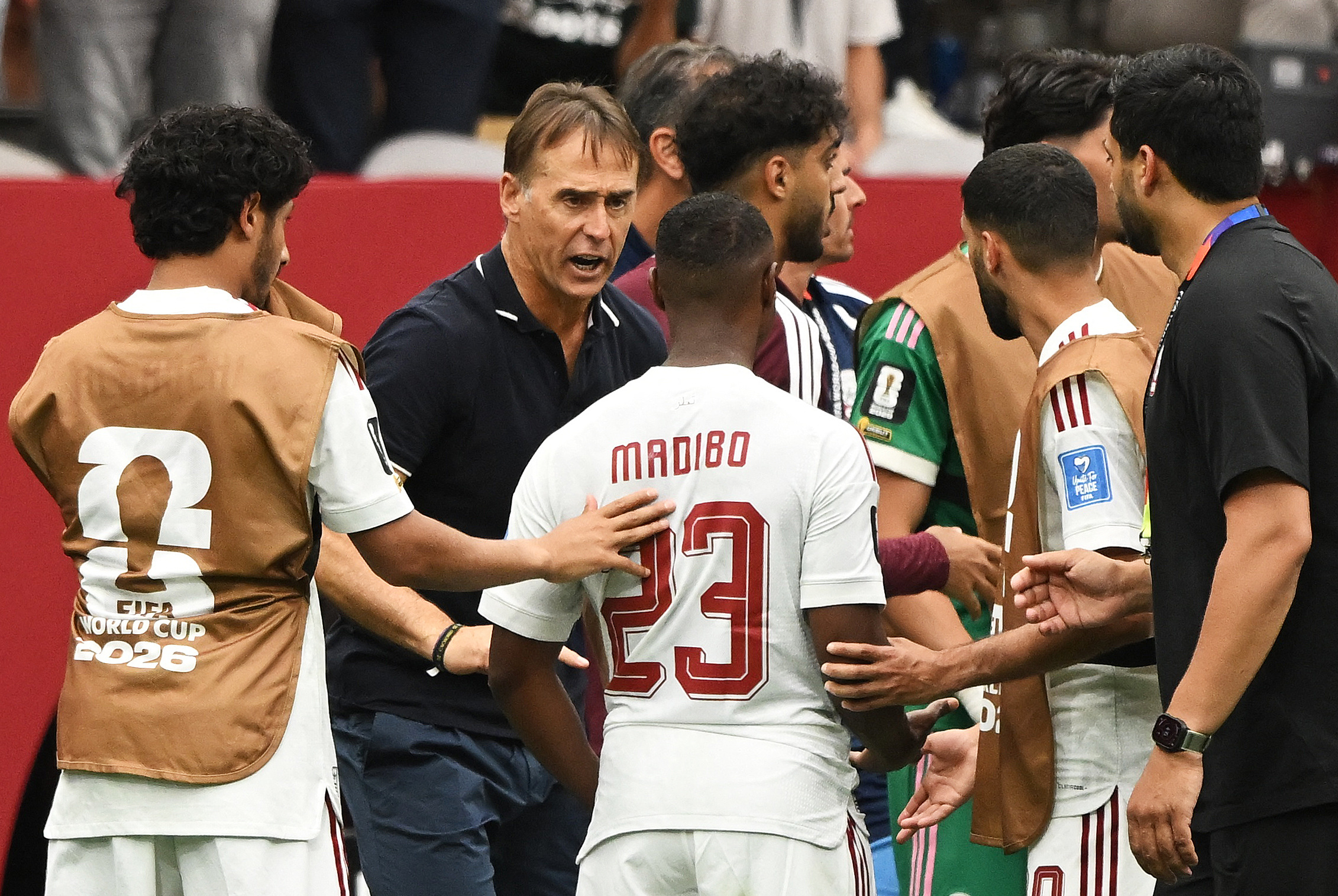 Soccer Football - FIFA World Cup 2026 - Group B - Canada v Qatar - BC Place, Vancouver, Canada - June 18, 2026 Qatar coach Julen Lopetegui reacts with Assim Madibo IMAGN IMAGES via Reuters/Anne-Marie Sorvin